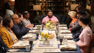 In the first episode of <i>Black and Jewish America</i>, Henry Louis Gates Jr. (third from left) sits down at a Seder table with Black, Jewish, and Black-Jewish scholars and community leaders.