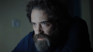 in <I>The Malevolent Bride</i>, Tom Avni plays Be’er Dov, a  formerly Hasidic physicist who has shed all religion.