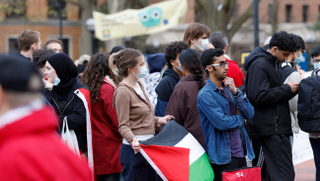 Pro-Palestinian demonstrators gather for a mock trial against the University of Michigan's Board of Regents on the university's campus in Ann Arbor, Michigan, on April 21, 2025.