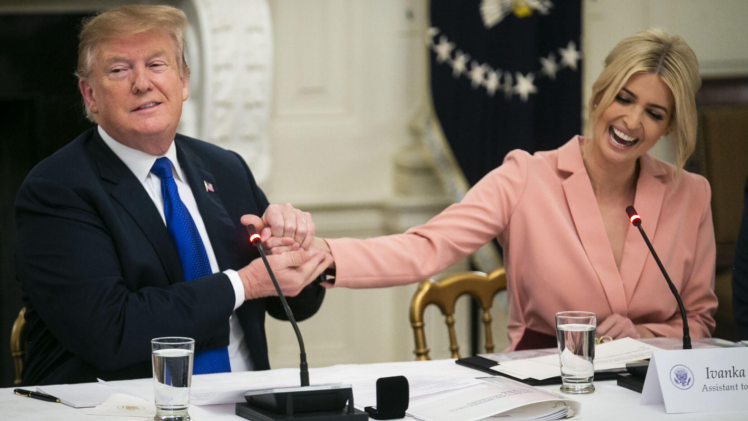 Donald Trump and his daughter Ivanka Trump attend an American Workforce Policy Advisory board meeting in the White House on Wednesday, March 6, 2019