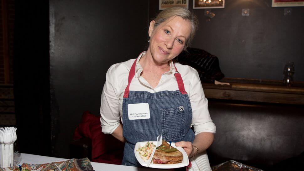 Chef Heidi Rae Weinstein with her meaty, cheesy Reuben sandwich.