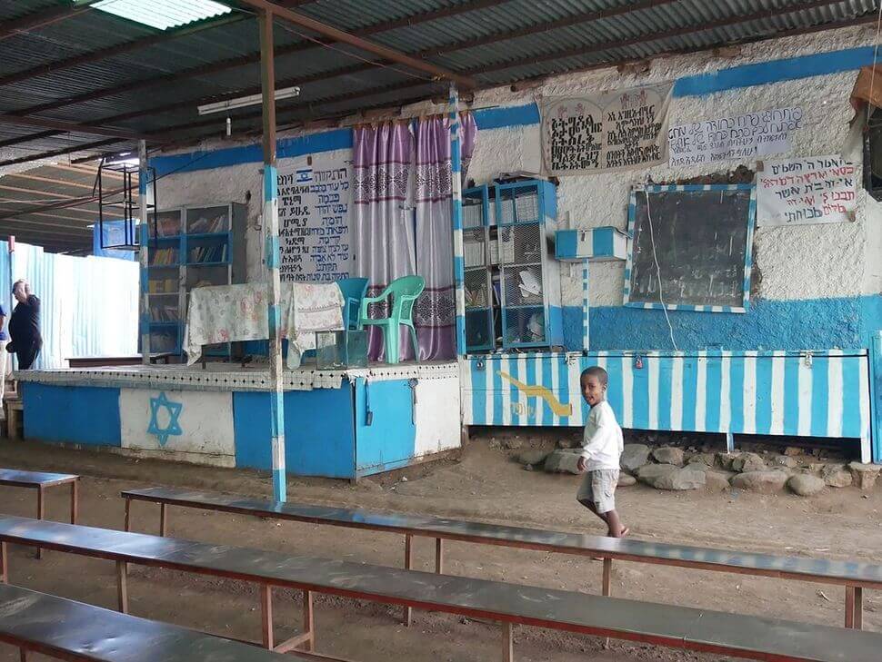 Child plays in the Hatikva synagogue.