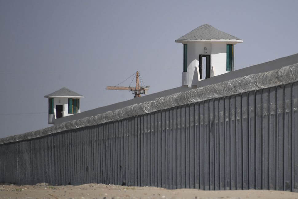 This photo taken on May 31, 2019 shows watchtowers on a high-security facility near what is believed to be a re-education camp where mostly Muslim ethnic minorities are detained, on the outskirts of Hotan, in China’s northwestern Xinjiang region.