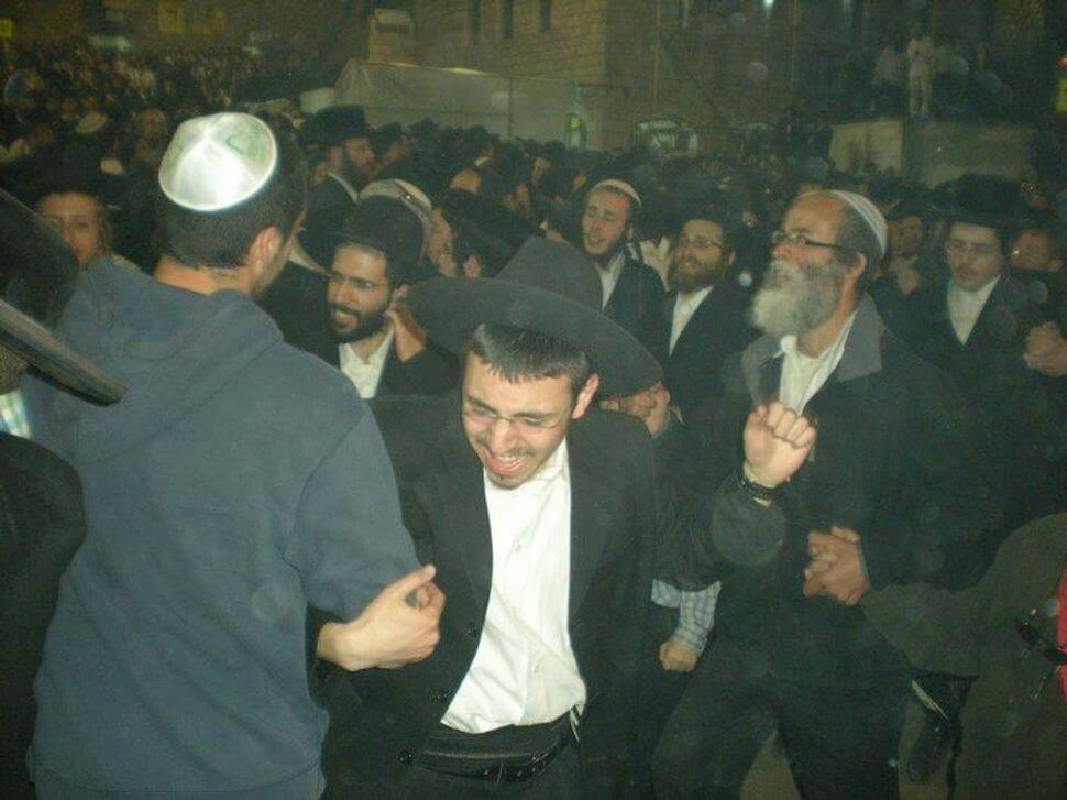 A friend of the author’s dances on Lag B’Omer on Mount Meron.