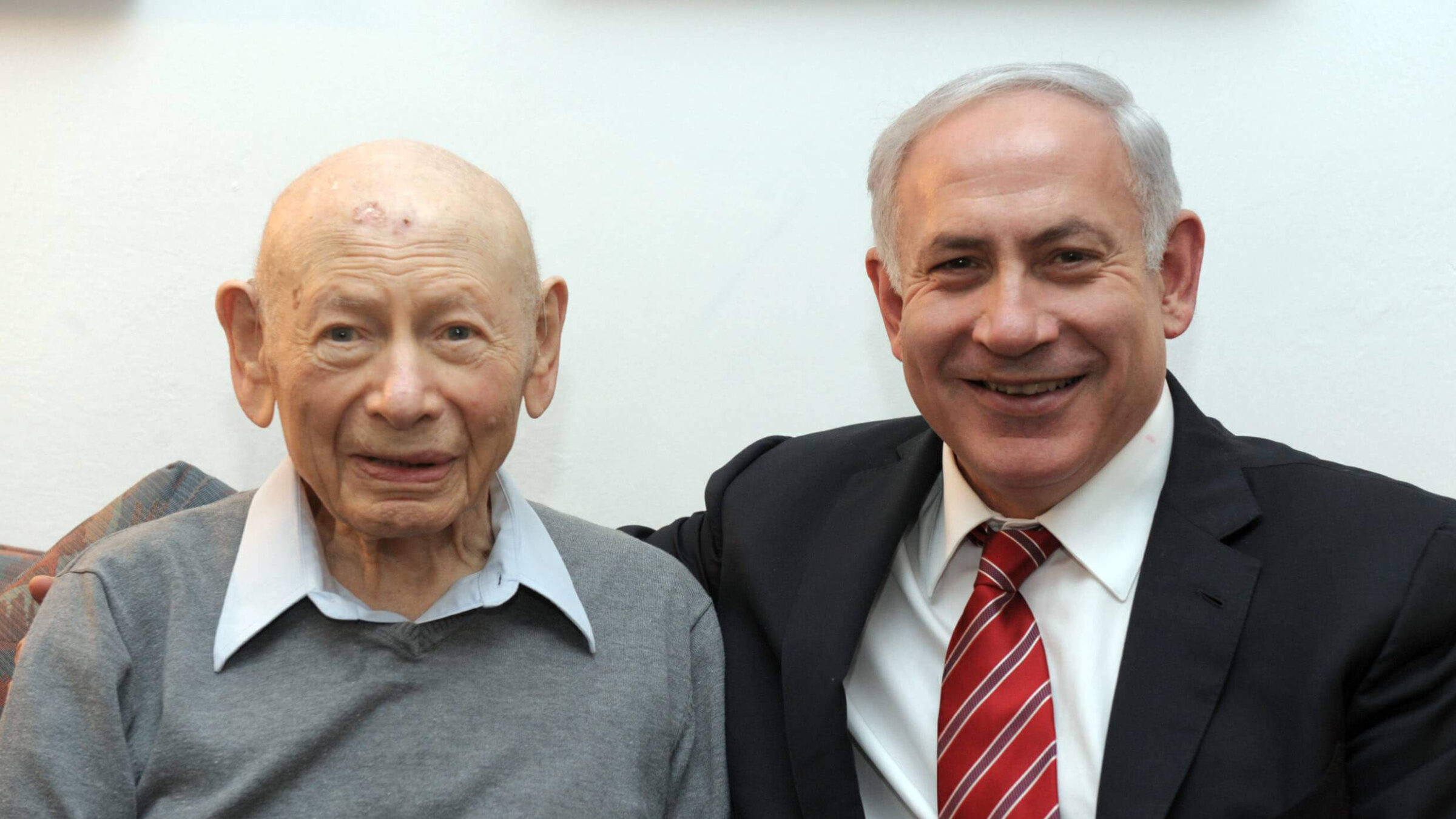 Benjamin Netanyahu (R) sits with his father, Professor Benzion Netanyahu, on March 25, 2012.