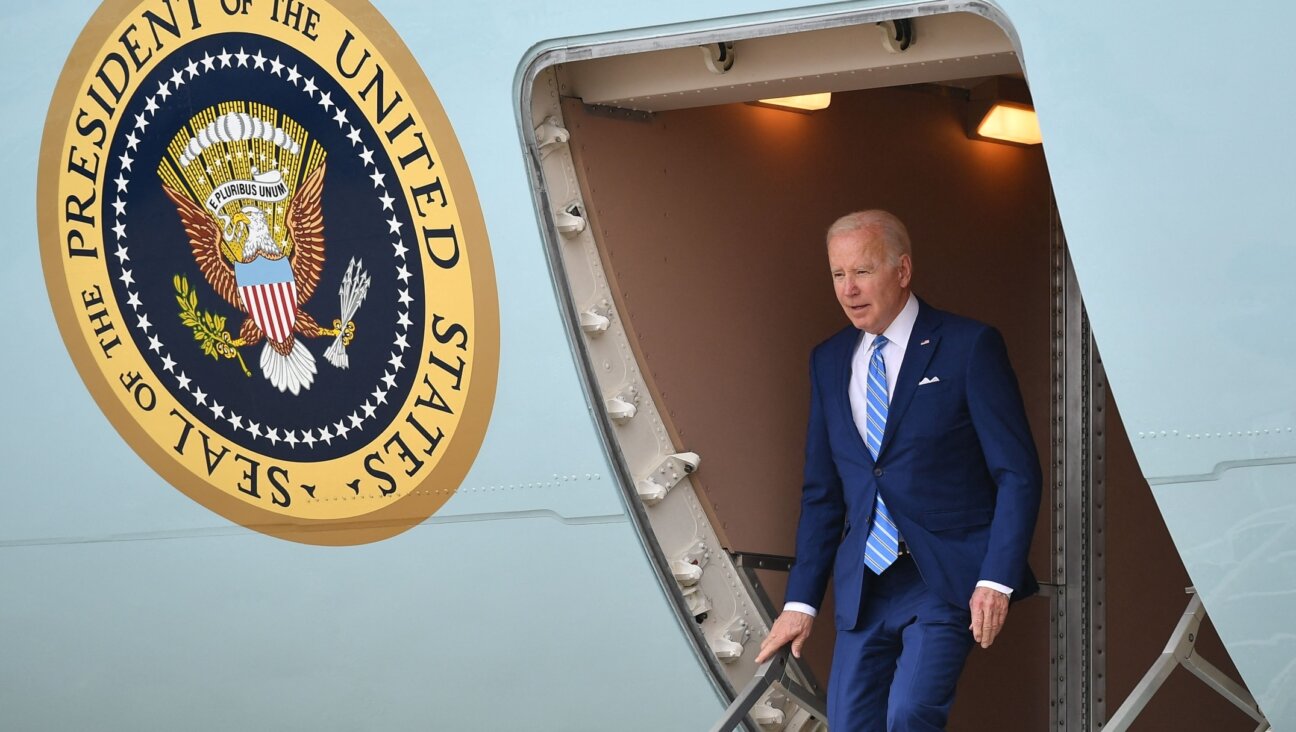 President Joe Biden steps off Air Force One upon arrival at Des Moines International Airport in Des Moines, April 12, 2022.