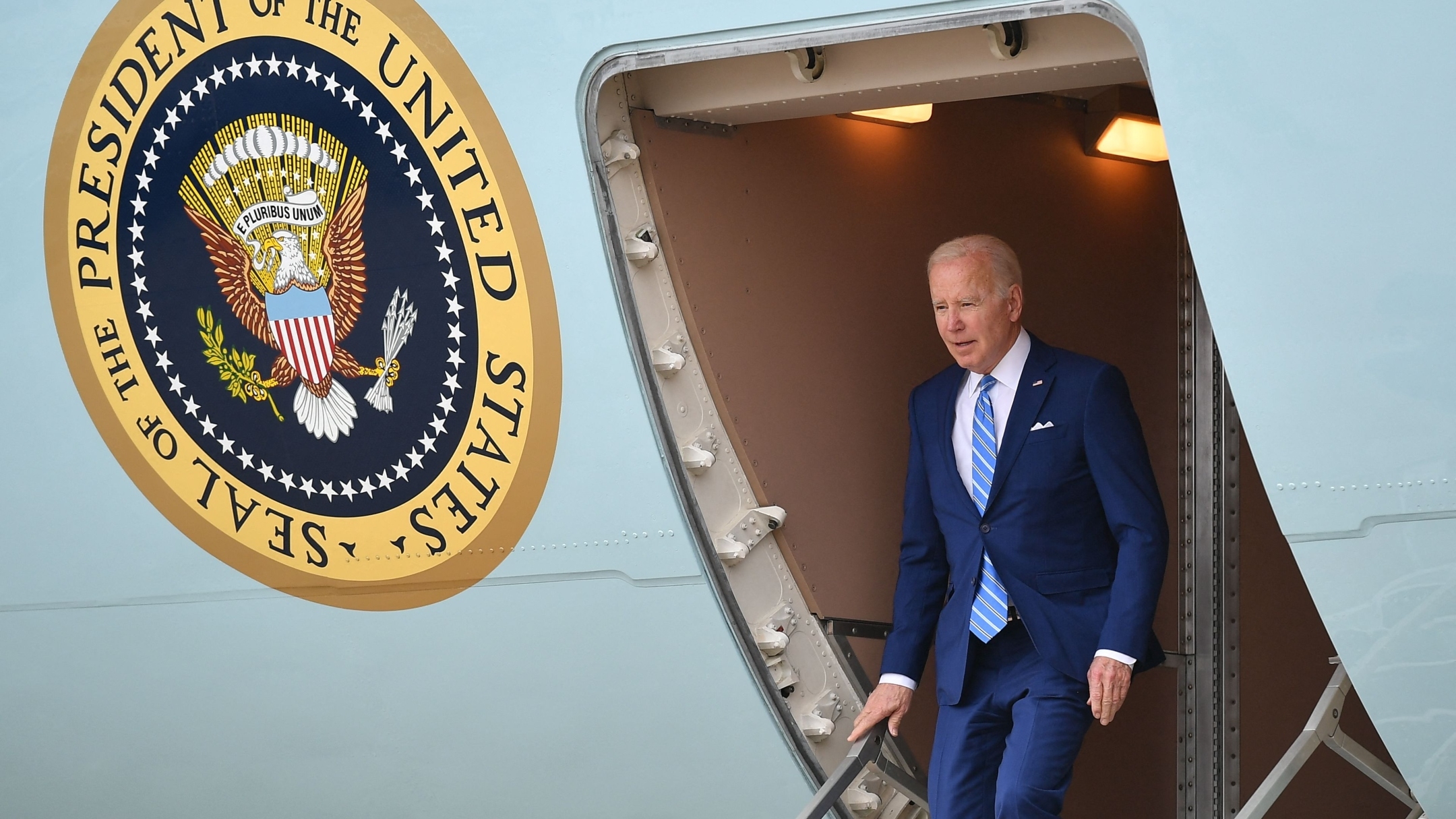 President Joe Biden steps off Air Force One upon arrival at Des Moines International Airport in Des Moines, April 12, 2022.