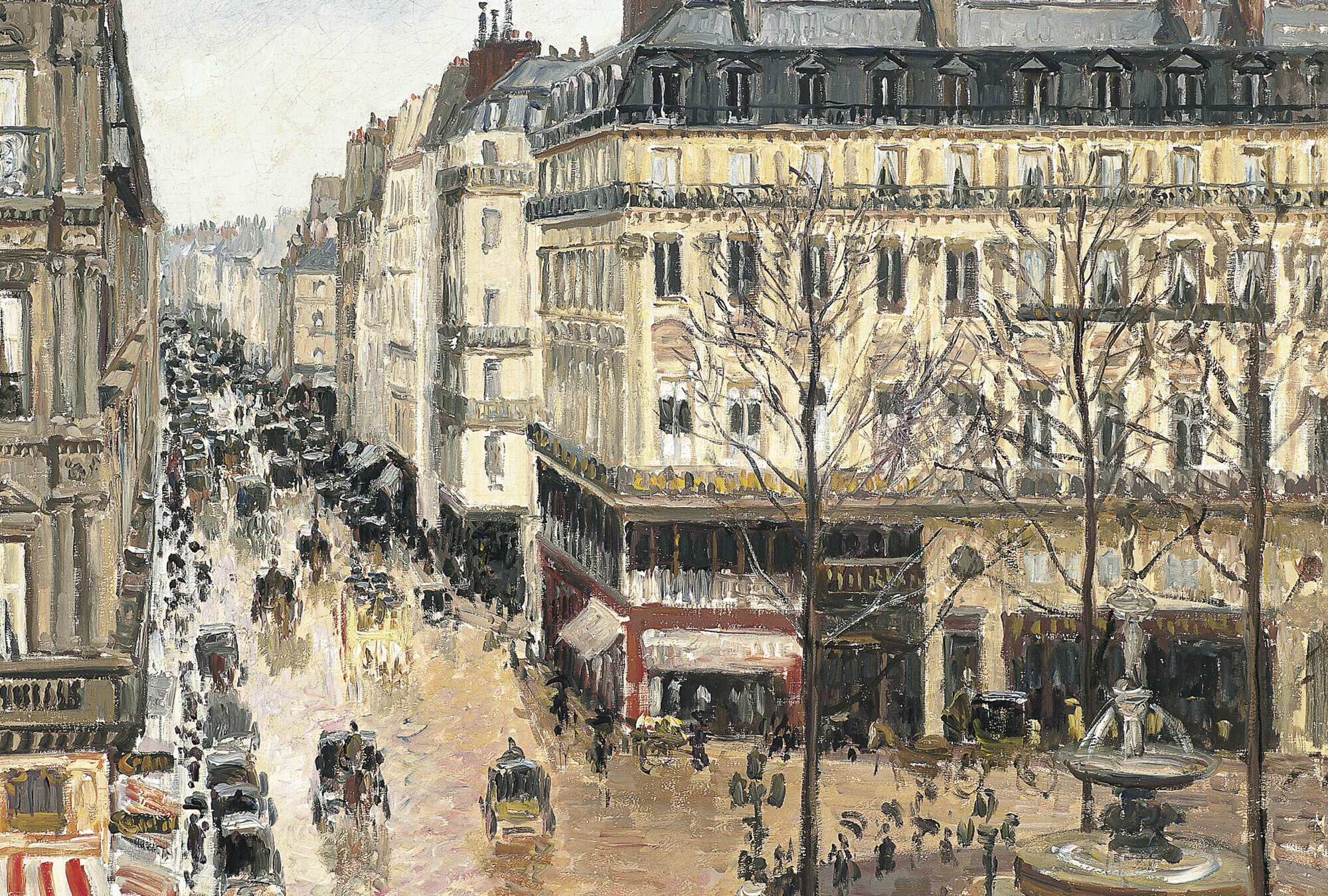 Grand avenues in modern Paris glistening during an afternoon rain.