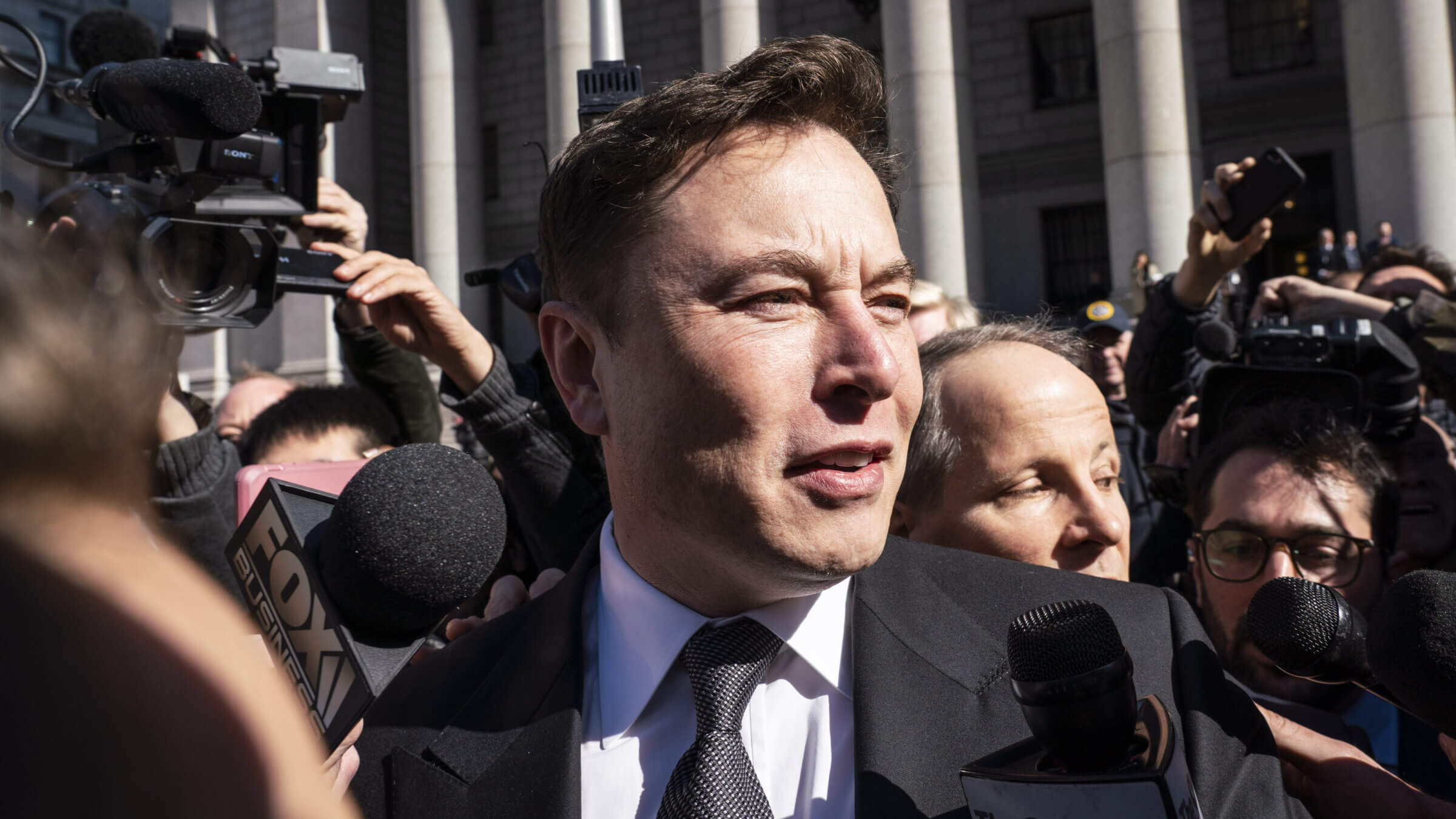 Elon Musk departs from federal court in New York on Thursday, April 4, 2019