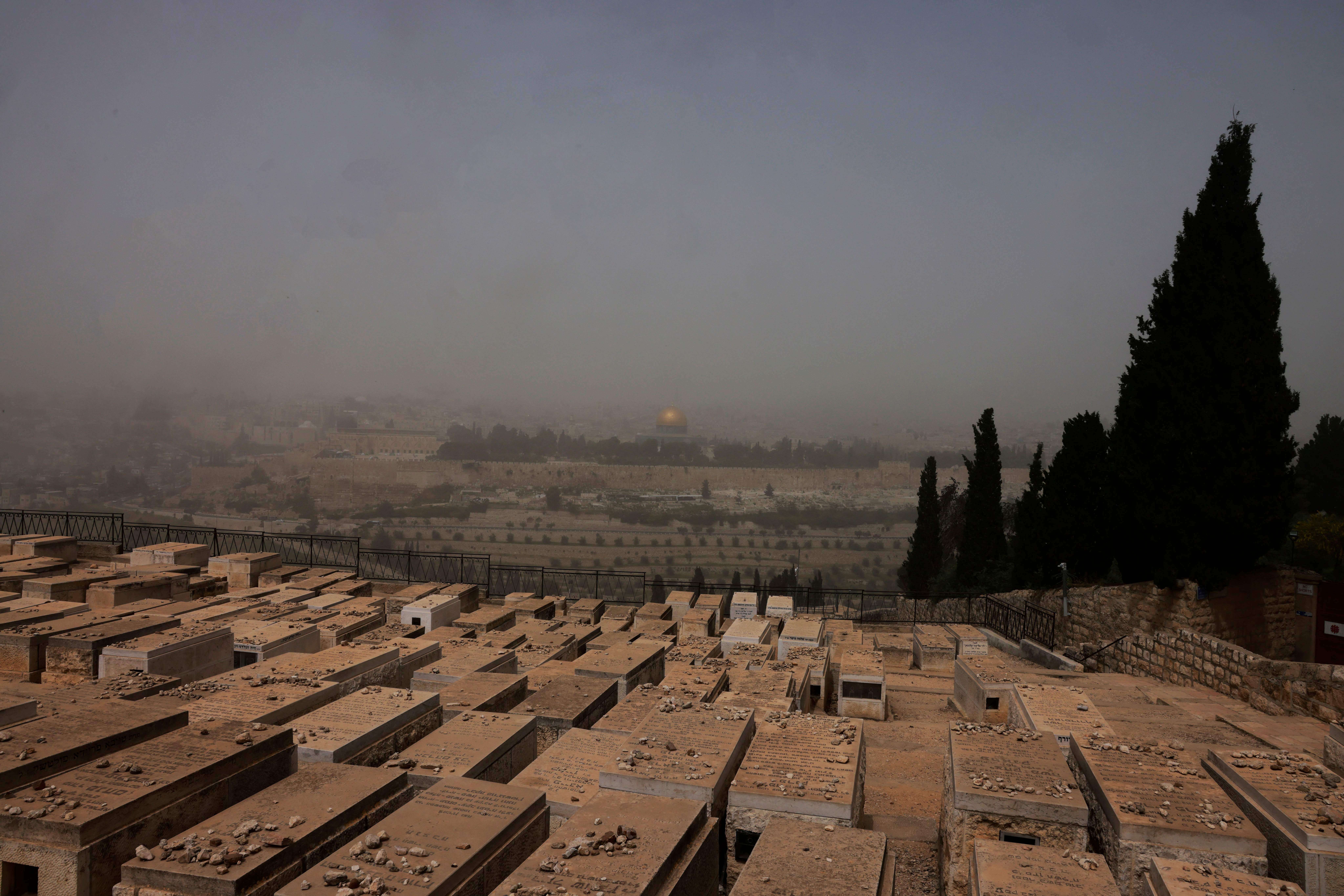 A view of Jerusalem's Old City, during a dust storm, from the Mount of Olives.