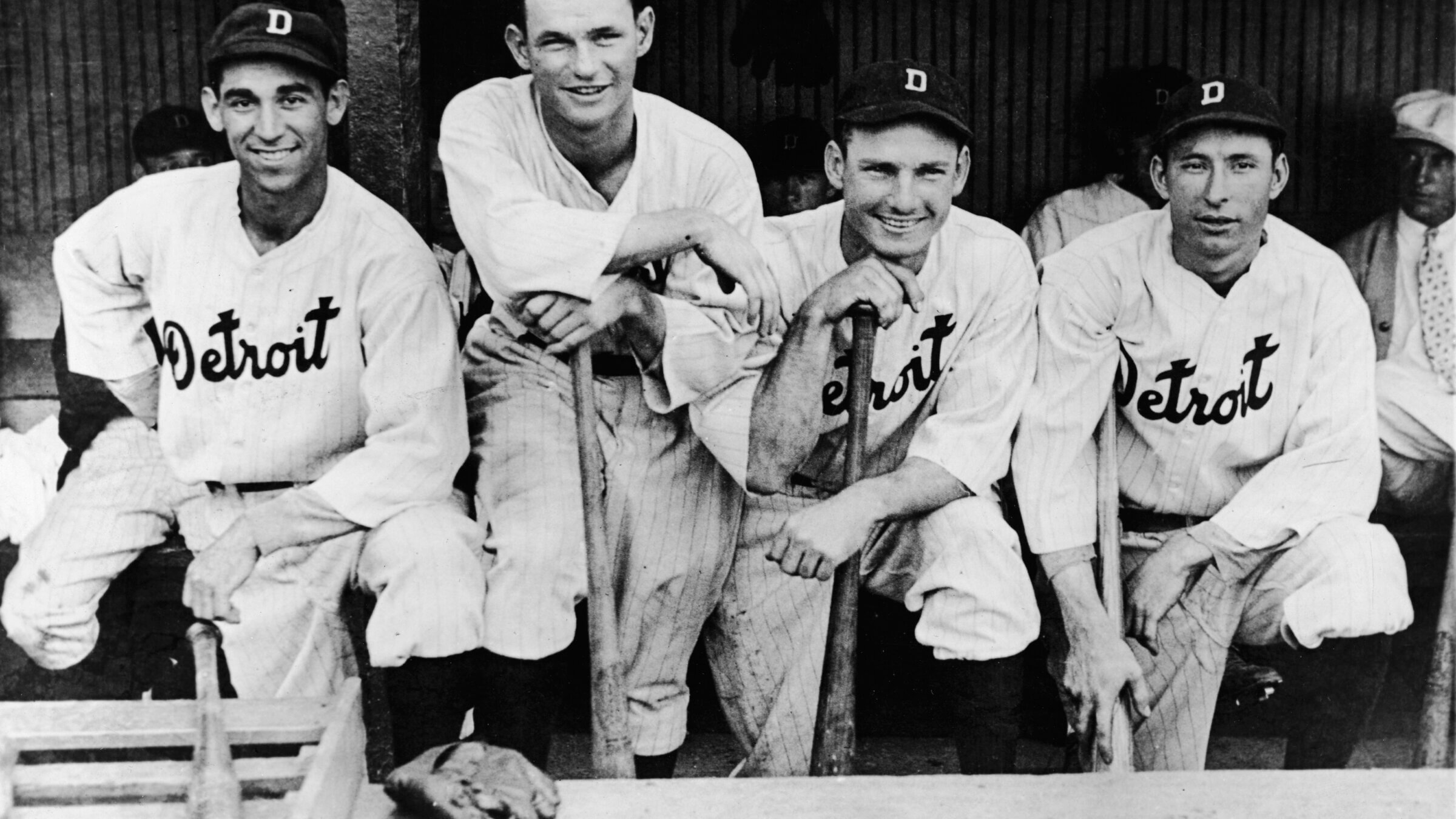 Four members of the Detroit Tigers baseball team pose in the dugout on July 5, 1932. From left, Ukrainian-born Izzy Goldstein (1908 - 1993) and Americans Harry Davis (1908 - 1997), Gee Walker (1908 - 1981), and Heinie Schuble (1906 - 1990)