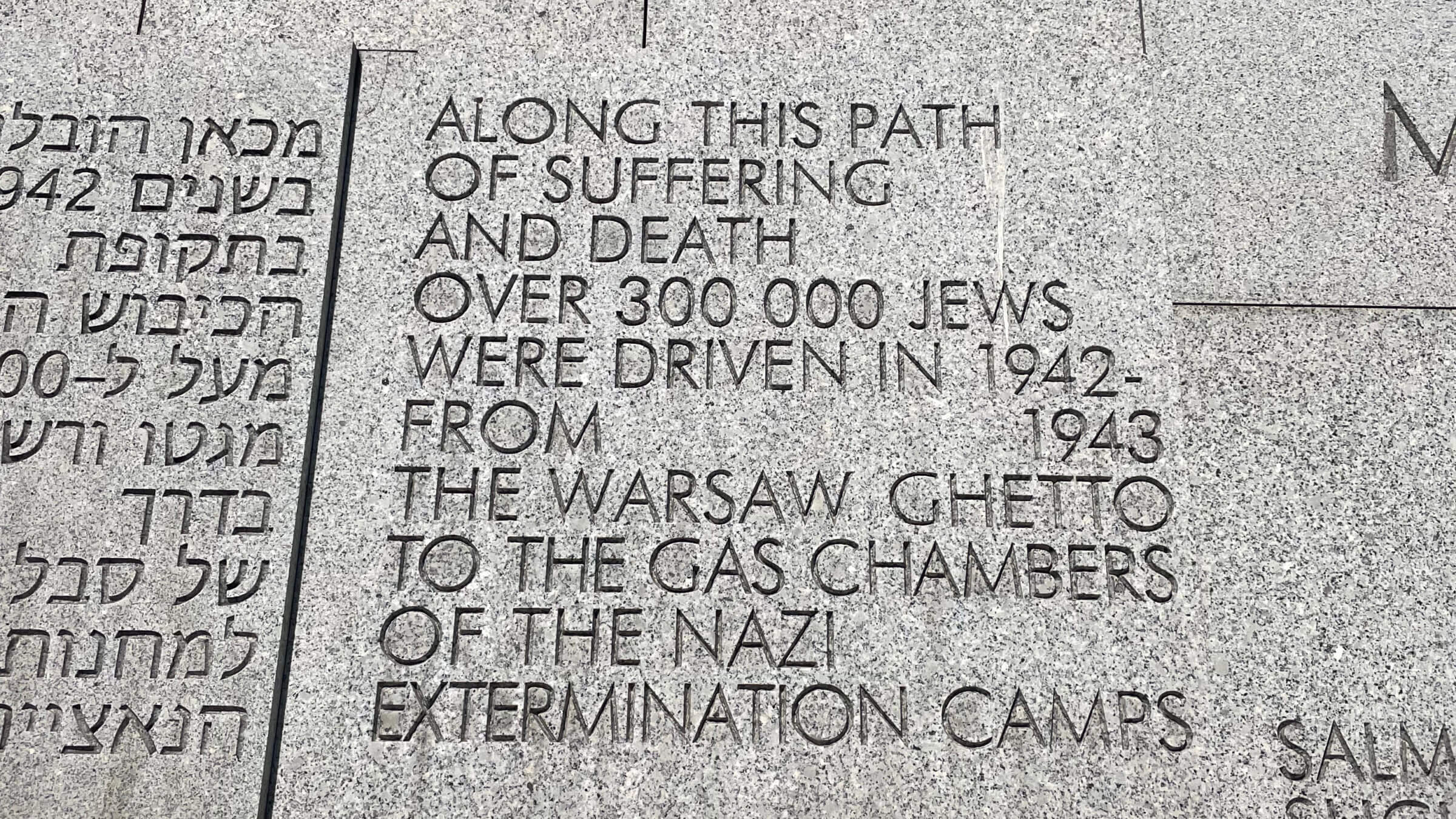 An inscription at the Umschlagplatz, the point near the Warsaw ghetto from which 300,000 Jews were loaded onto trains bound for death camps.