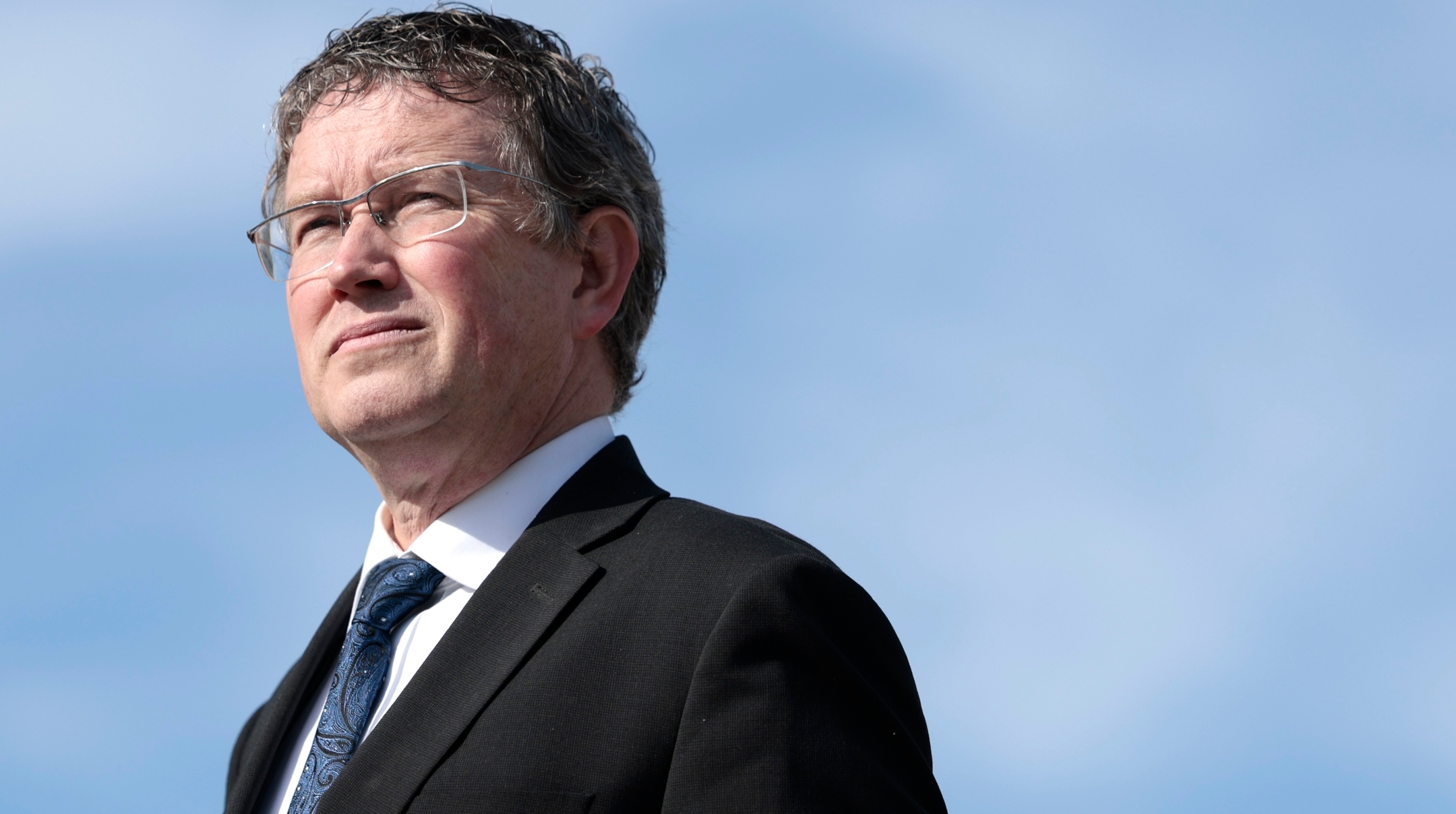 Rep. Thomas Massie listens at a press conference, alongside members of the Second Amendment Caucus, outside the U.S. Capitol, March 8, 2022. (Anna Moneymaker/Getty Images)