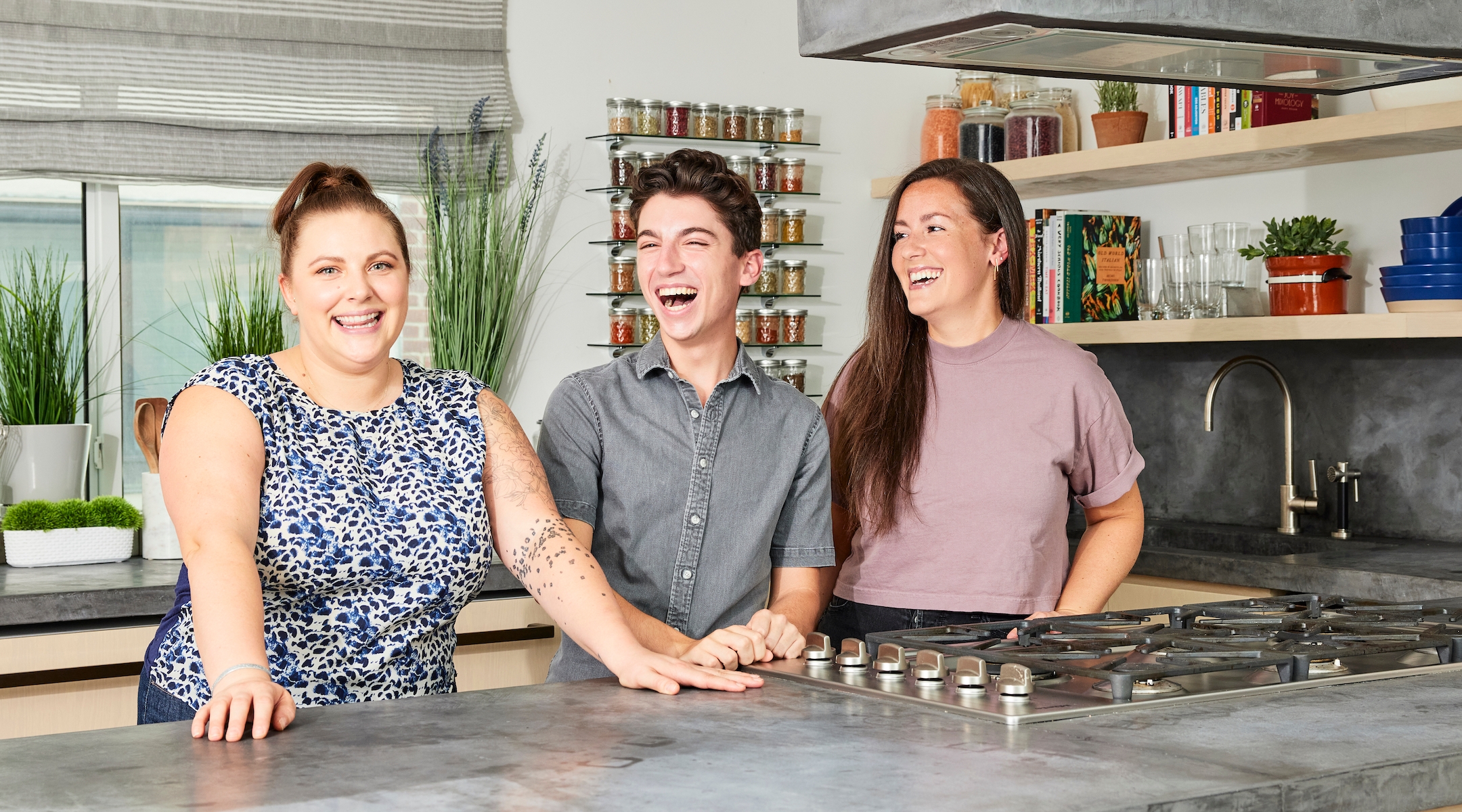 Eitan Bernath in his Manhattan test kitchen and apartment, with his culinary producers Rachel Dolfi, left, and Olivia Anderson. (Courtesy)