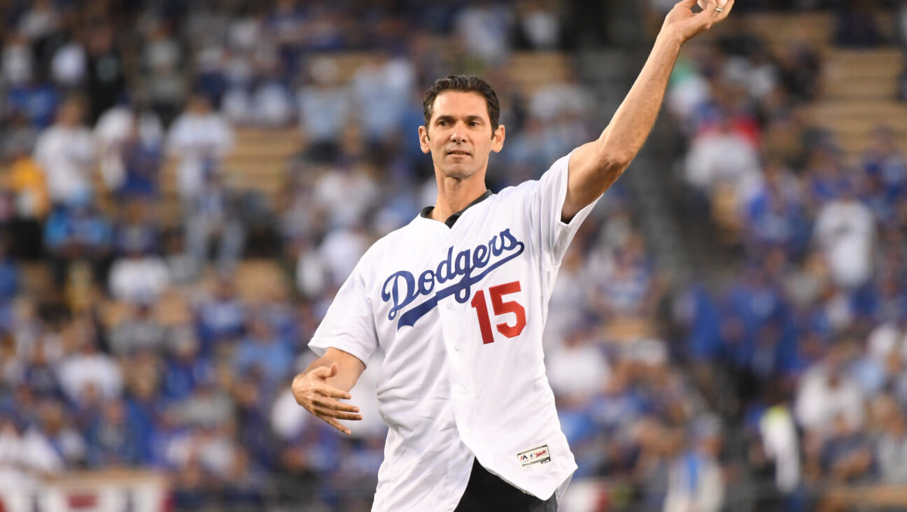 Former Los Angeles Dodgers player Shawn Green throwing out the ceremonial first pitch at Dodger Stadium in 2018.