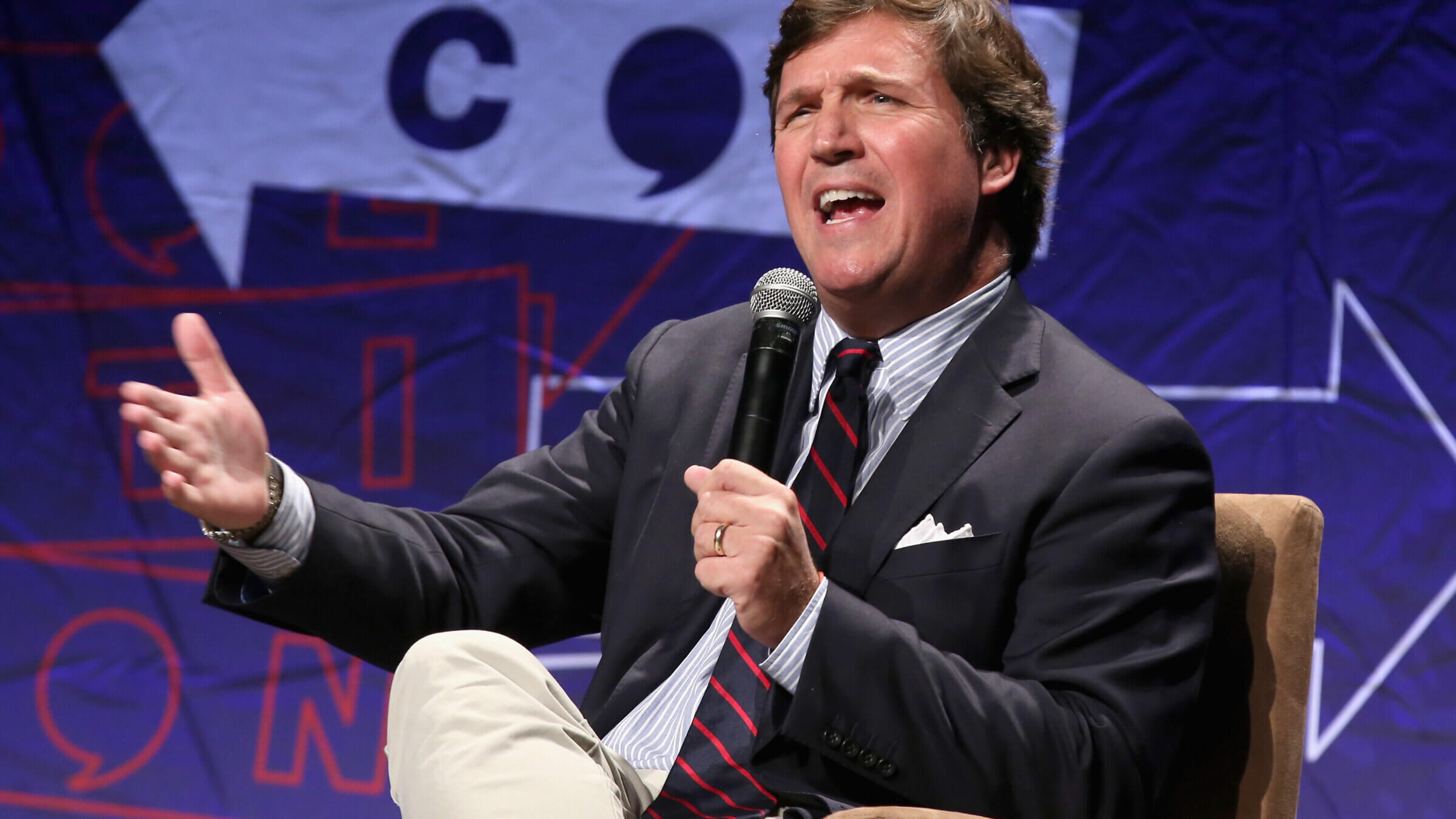 Tucker Carlson speaks onstage during Politicon 2018 at Los Angeles Convention Center on October 21, 2018 in Los Angeles