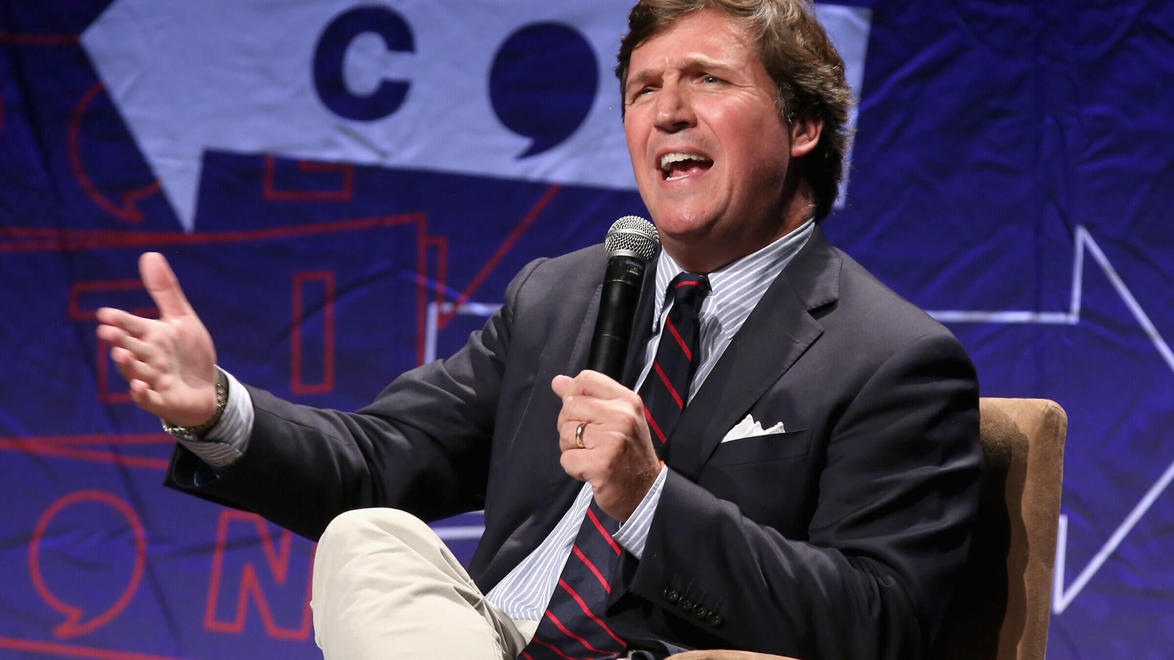 Tucker Carlson speaks onstage during Politicon 2018 at Los Angeles Convention Center on Oct. 21, 2018 in Los Angeles.