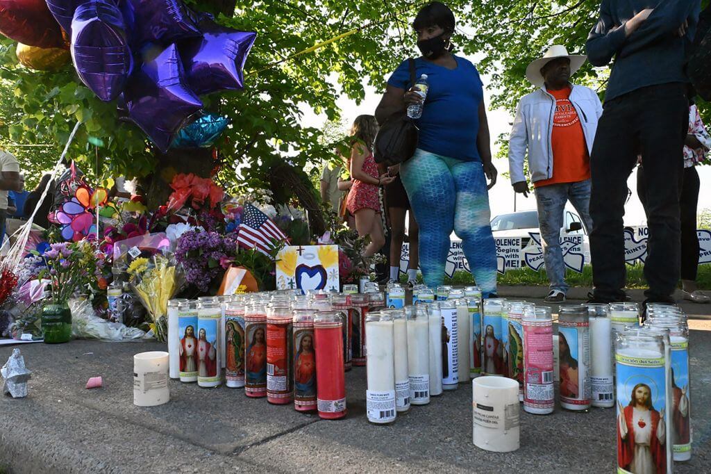 A makeshift memorial near a Tops Grocery store in Buffalo, New York, on May 15, 2022, the day after a gunman shot dead 10 people.