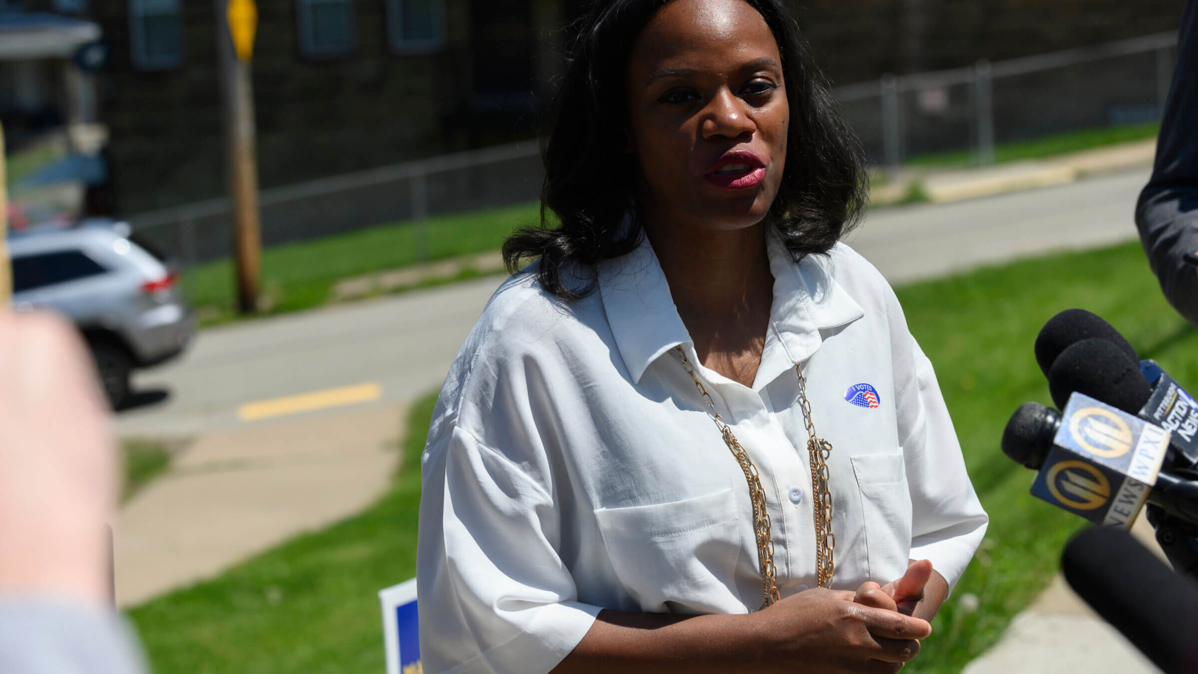 State Rep. Summer Lee talks to the press outside her polling station at the Paulson Recreation Center after voting on May 17, 2022