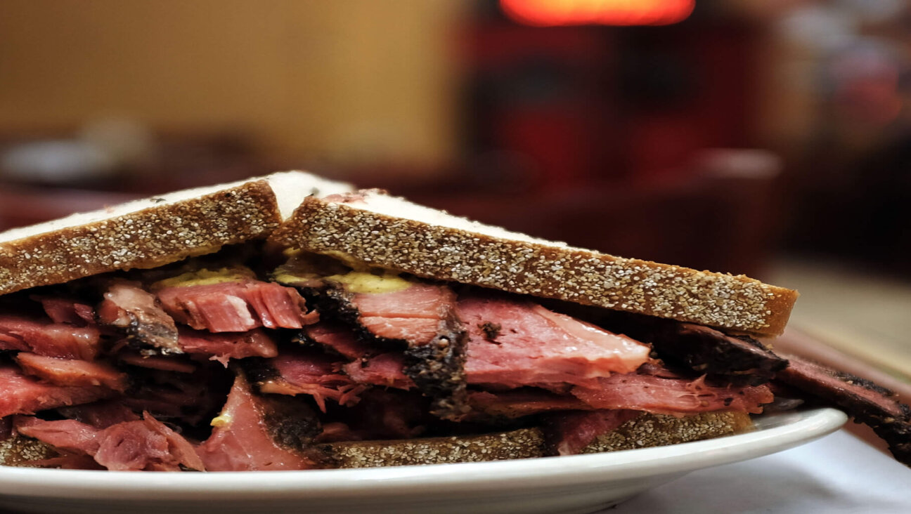 A sign at Katz's claims the deli invented pastrami in 1888.