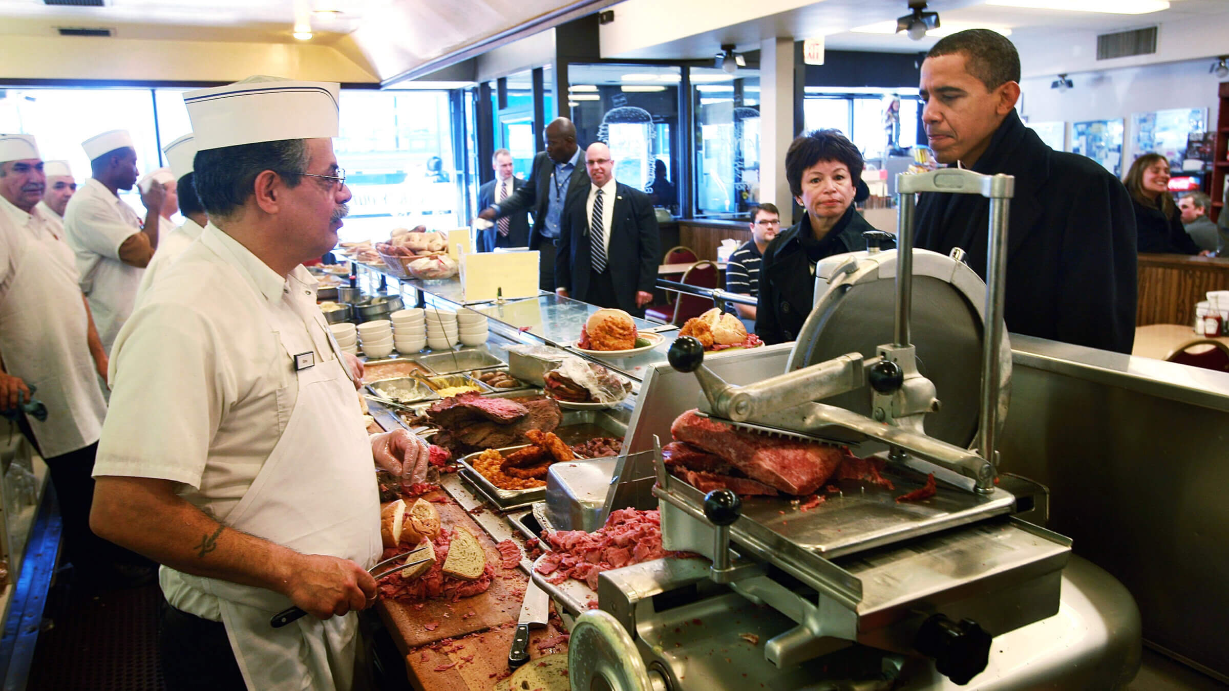 President Barack Obama surveys the pastrami sandwiches and other offerings at Manny's Deli in Chicago in 2008.