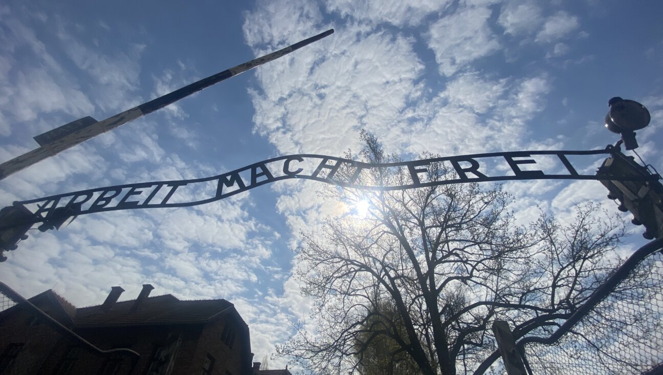 The sign “Arbeit Macht Frei,” or “Work Will Make You Free,” hangs at the entrance of Auschwitz-Birkenau.