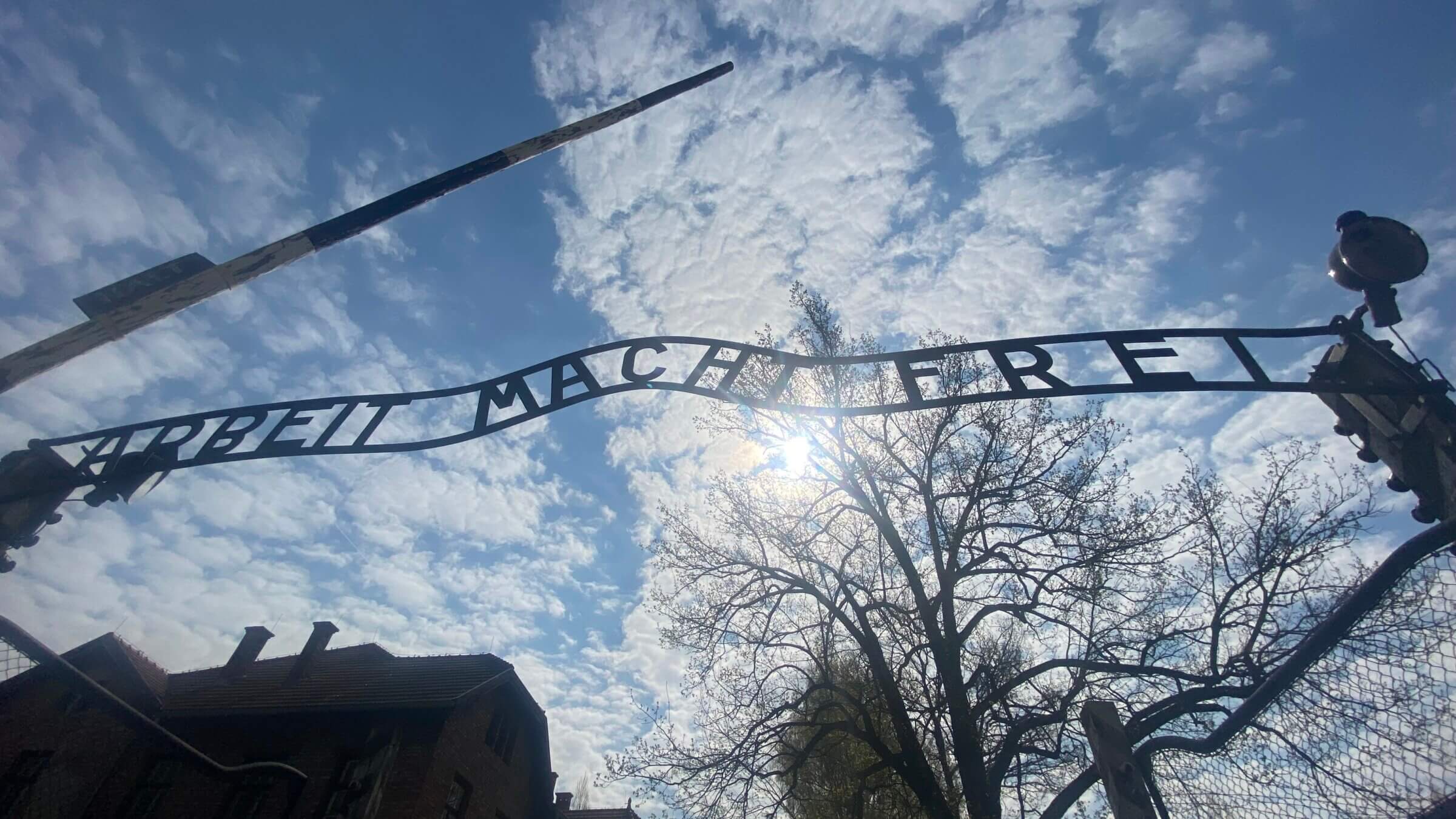 The sign “Arbeit Macht Frei,” or “Work Will Make You Free,” hangs at the entrance of Auschwitz-Birkenau.