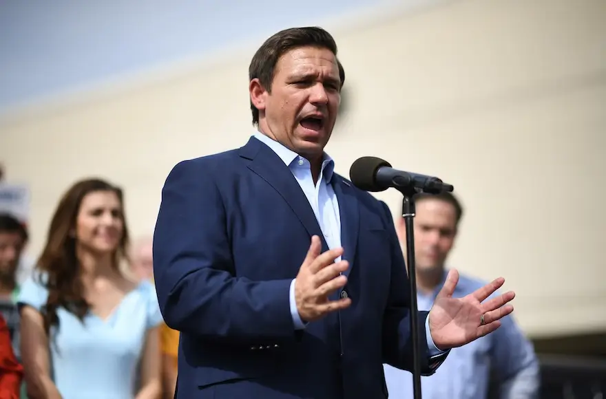 Ron DeSantis, shown at a rally at Freedom Pharmacy in Orlando, Fla.