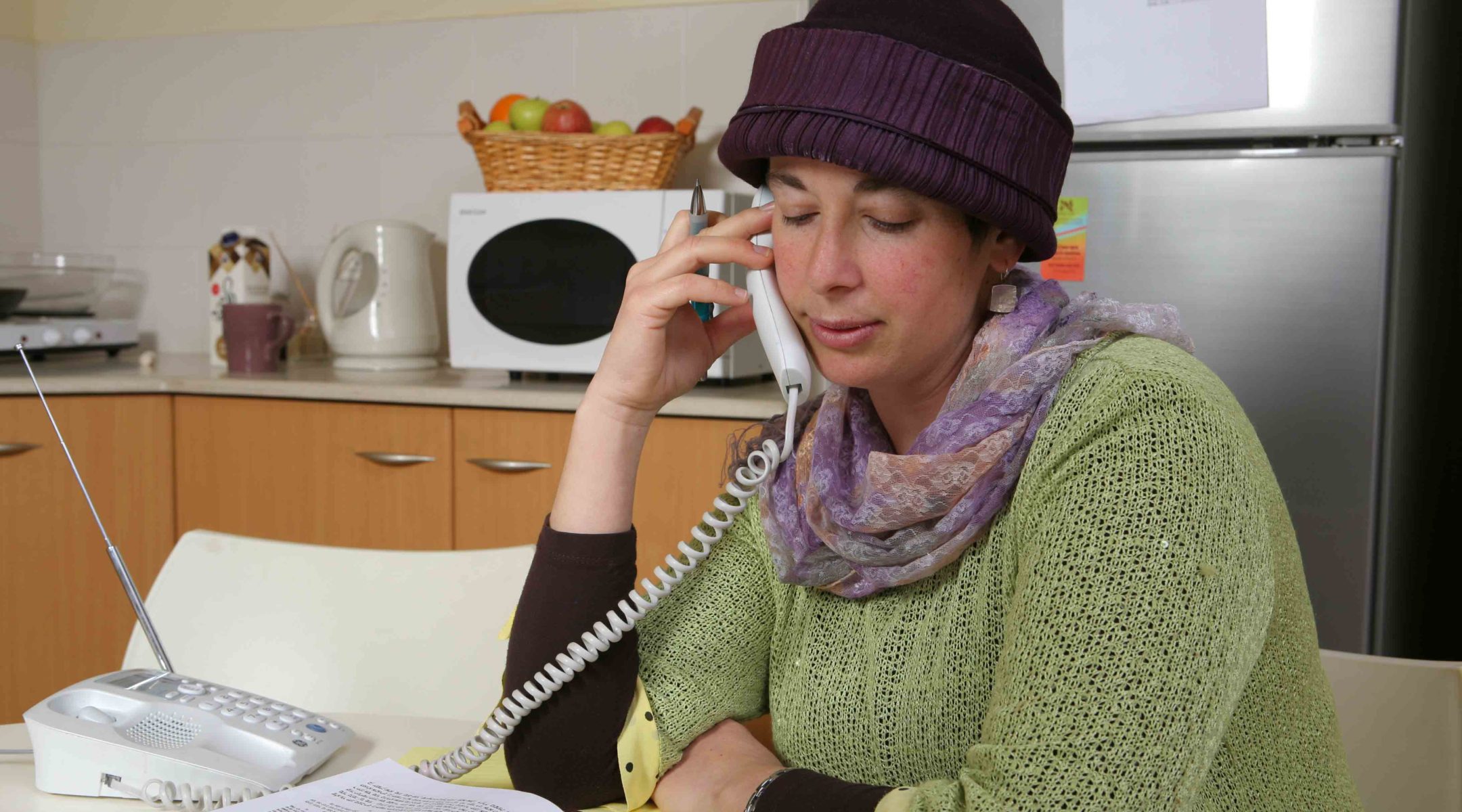 In a 2009 photo, A yoetzet halachah, or Jewish legal counselor, answers a hotline for women with questions relating to Jewish laws on sex and intimacy. (Courtesy Nishmat)