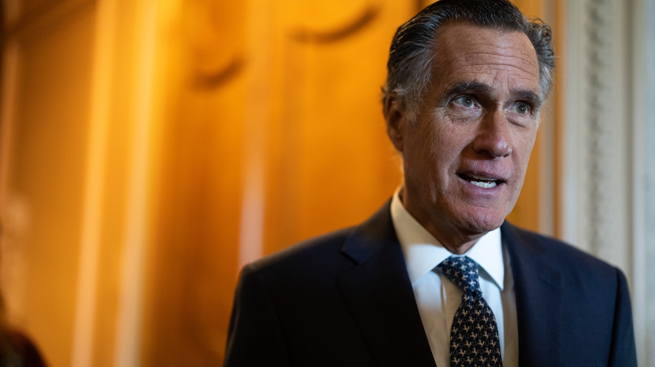 Sen. Mitt Romney, a Utah Republican, speaks to reporters outside of the Senate Chambers during a series of votes in the U.S. Capitol Building, May 11, 2022. (Anna Moneymaker/Getty Images)