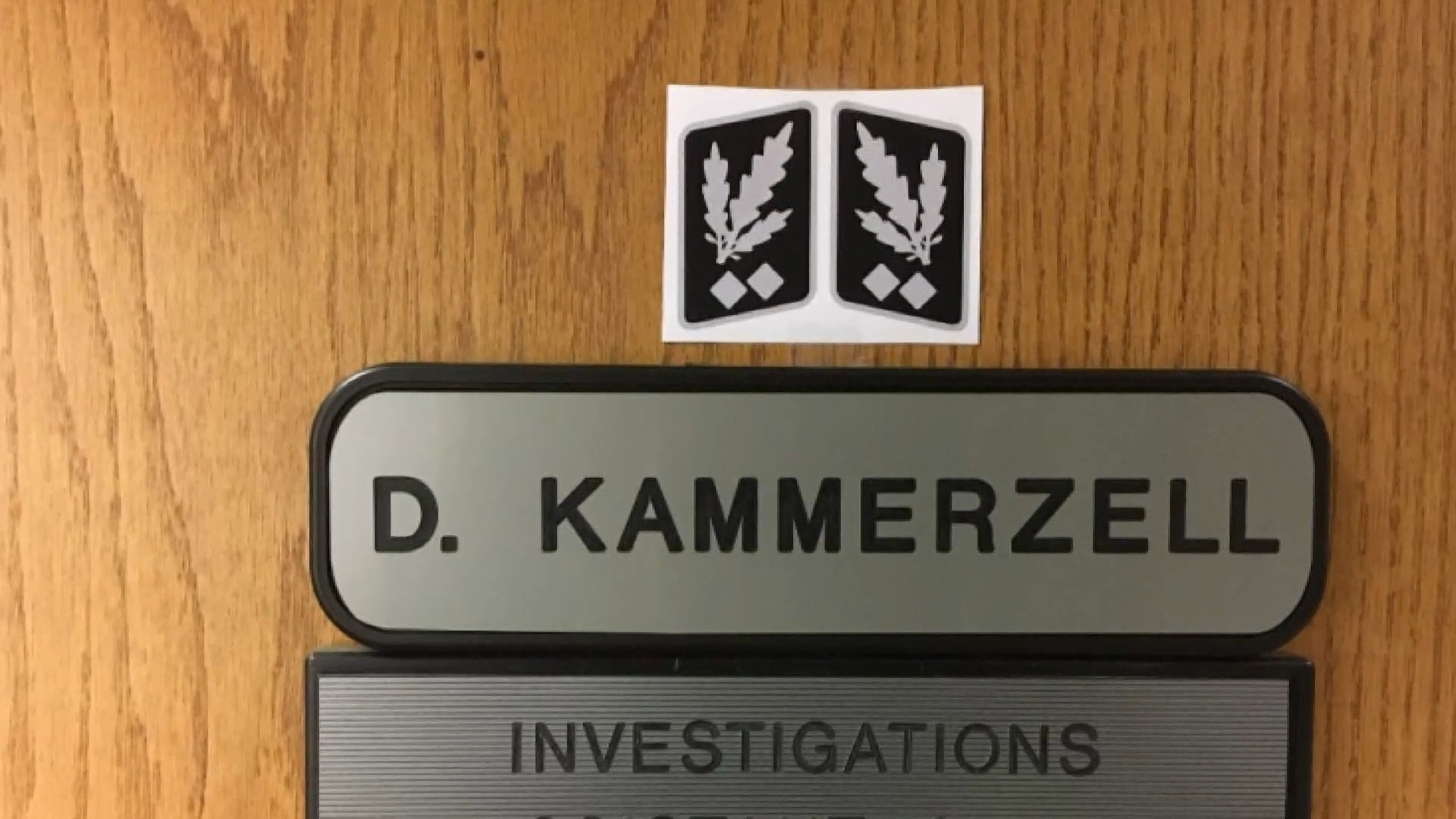 A Washington State assistant police chief taped the insignia of an SS officer over his nameplate on his door. (YouTube)