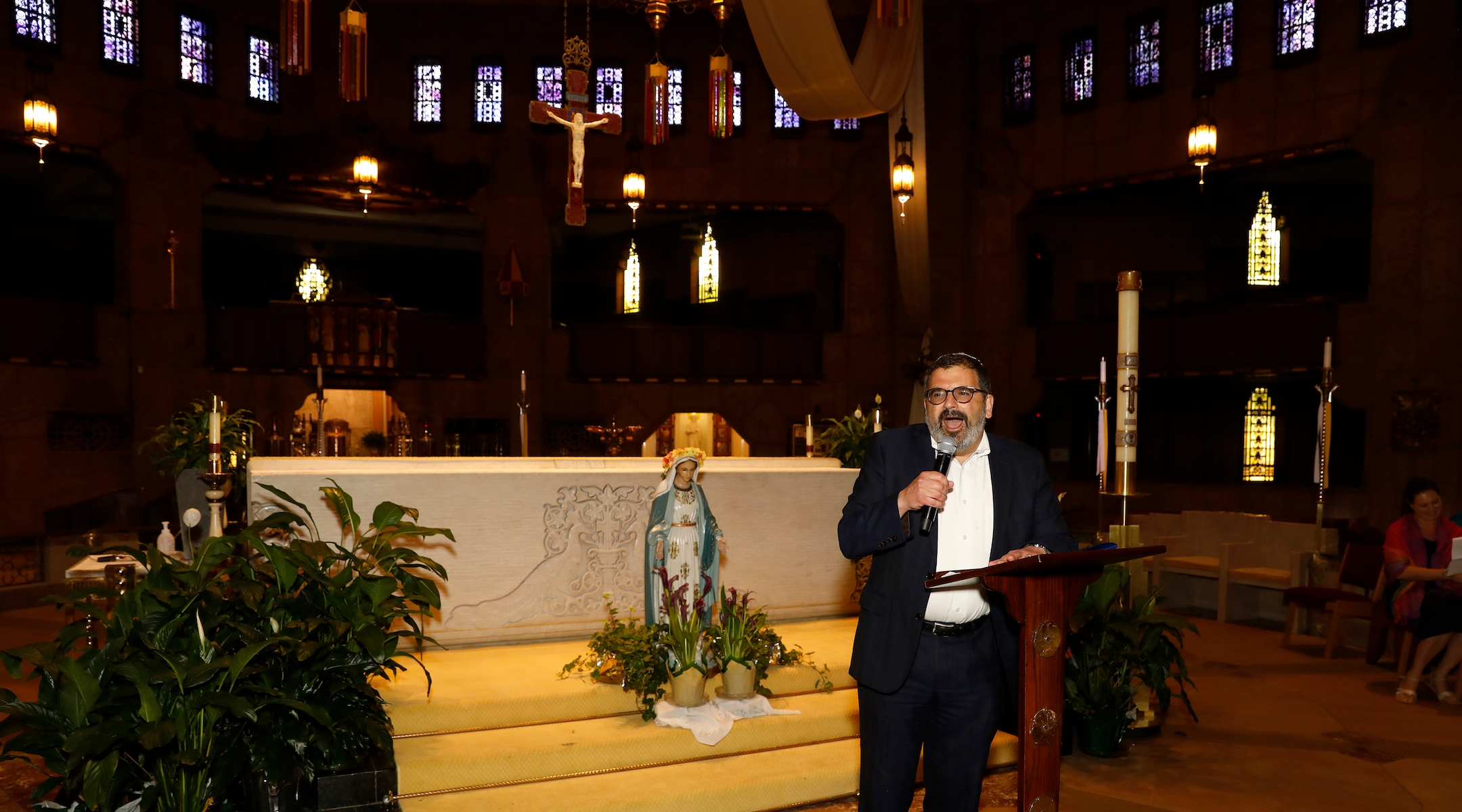 Rabbi Asher Lopatin, executive director of the Detroit JCRC/AJC, speaks from the old dais of Father Charles Coughlin at the National Shrine of the Little Flower Catholic church in Royal Oak, Mich., May 31, 2022. Lopatin had helped organize an event at the church discussing “the Jewish-Catholic Relationship.” Shrine’s founder, Father Coughlin, broadcasted an antisemitic radio show during the Great Depression. (Jeff Kowalsky)