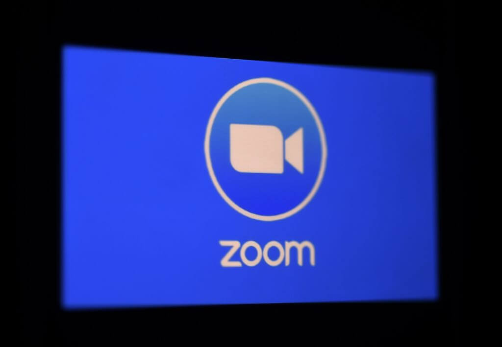 In this photo illustration a Zoom App logo is displayed on a smartphone.