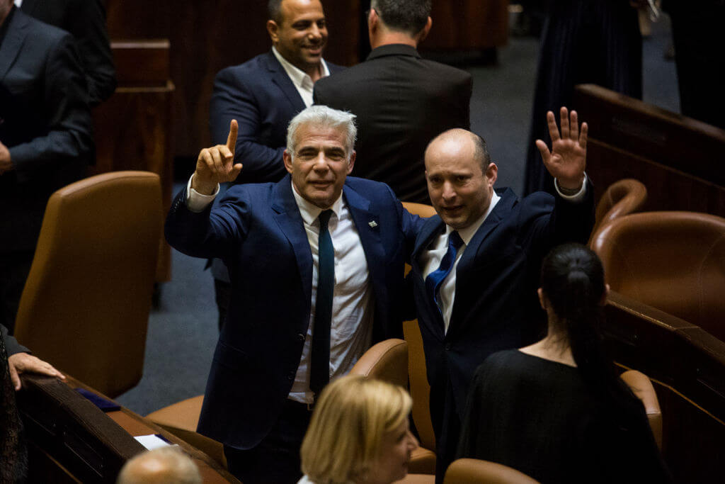 Israeli Foreign Minister Yair Lapid (left) and Naftali Bennnett when they took office in June, 2021.