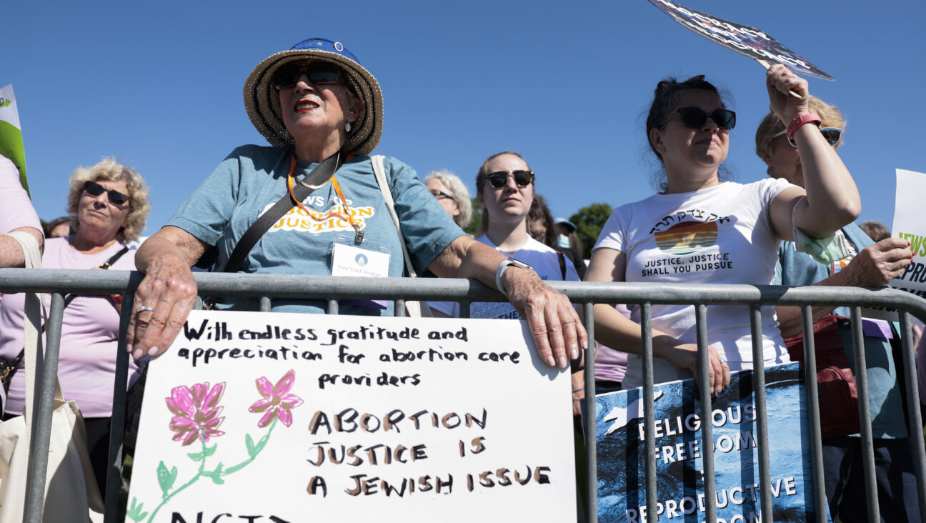 Protesters cheer as they attend the "Jewish Rally for Abortion Justice" rally near the U.S. Capitol in May. The National Council of Jewish Women, which sponsored the rally, and other Jewish groups are trying to change the narrative around religion and abortion.