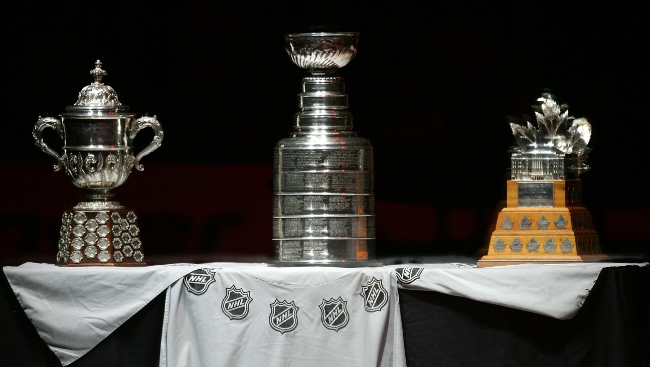 Stanley Cup. located between the Clarence Campbell Trophy and the Conn Smythe Trophy.