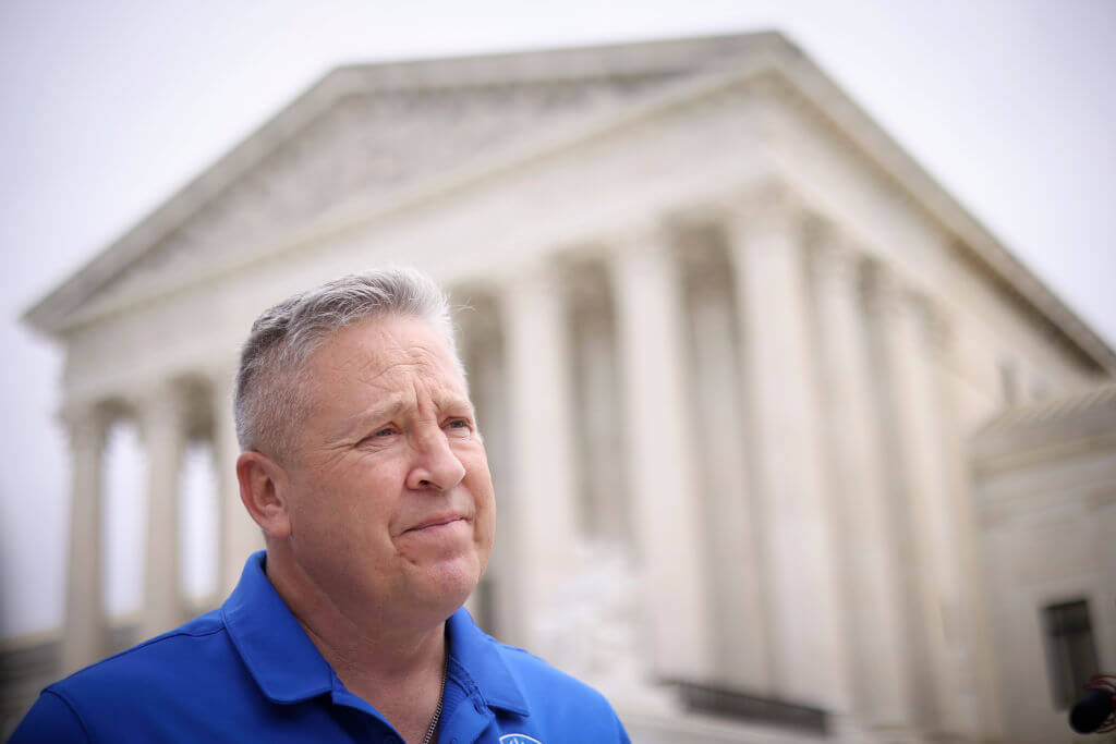 Former Bremerton High School assistant football coach Joe Kennedy answers questions after his legal case, Kennedy vs. Bremerton School District, was argued before the Supreme Court on April 25, 2022 in Washington, DC. 