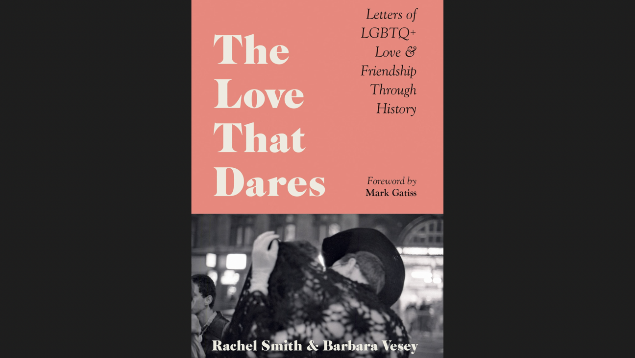 Cover of the book "The Love That Dares" showing a couple embracing behind a shawl