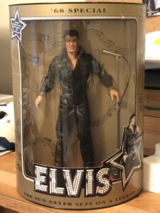 A doll of Elvis dressed in his 1968 comeback special all-leather outfit.