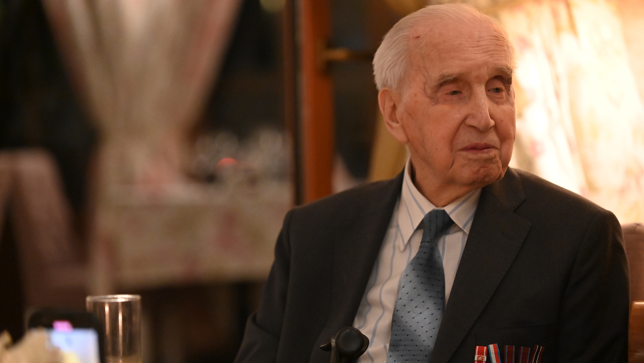 Jozef Walaszczyk, who saved more than 50 Jews during the Holocaust, tells his story at a restaurant in Warsaw, Poland on Jan. 28, 2020. (Cnaan Liphshiz)