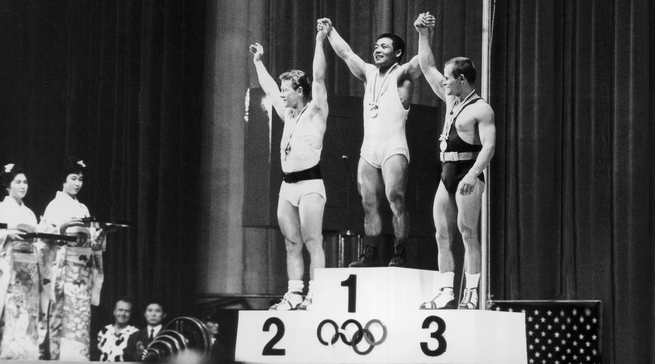 Isaac Berger, left, at the 1964 Tokyo Olympics. (Central Press/Hulton Archive/Getty Images)