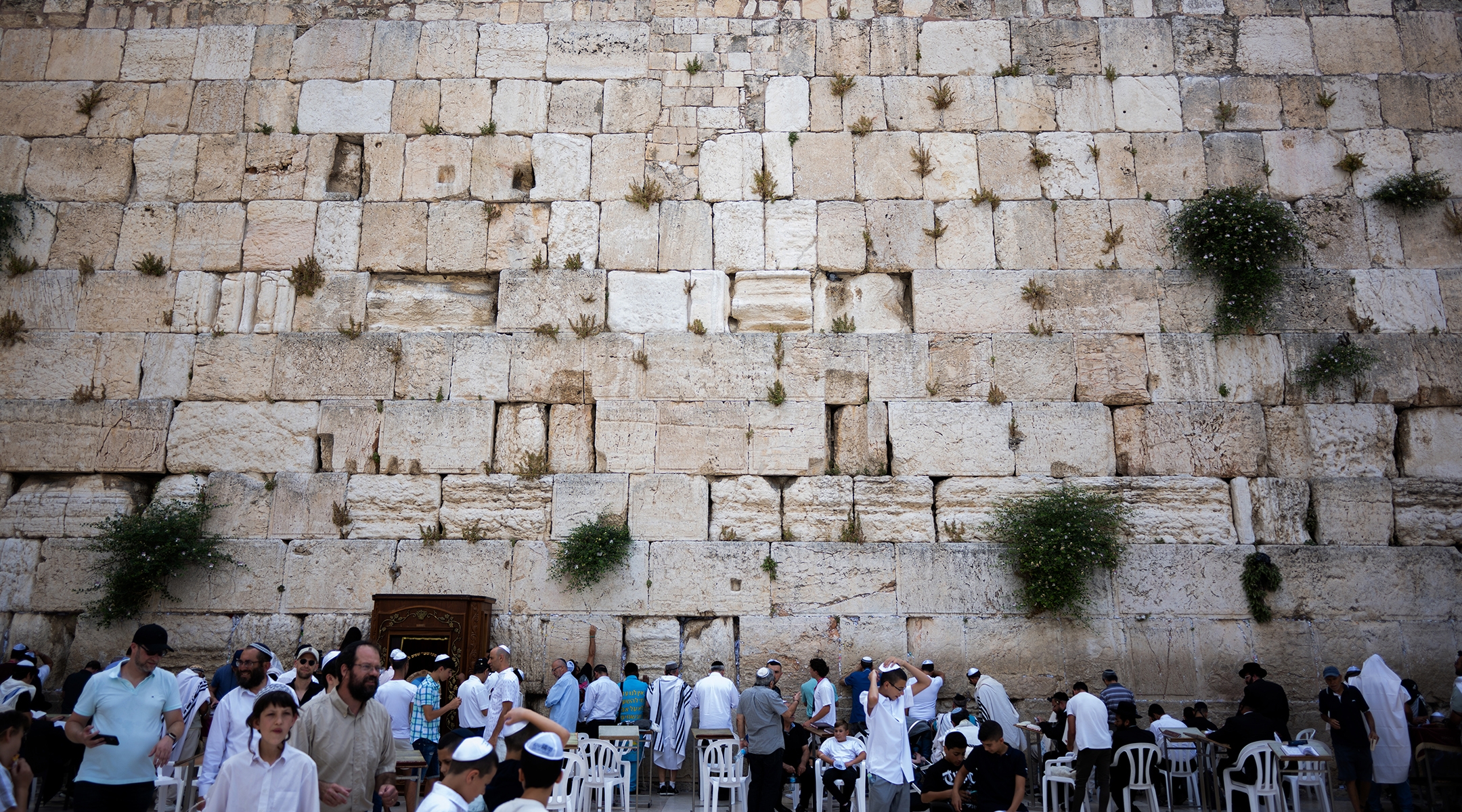 Jewish worshipers pray at the Western Wall in the Old City of Jerusalem, June 13, 2022. 