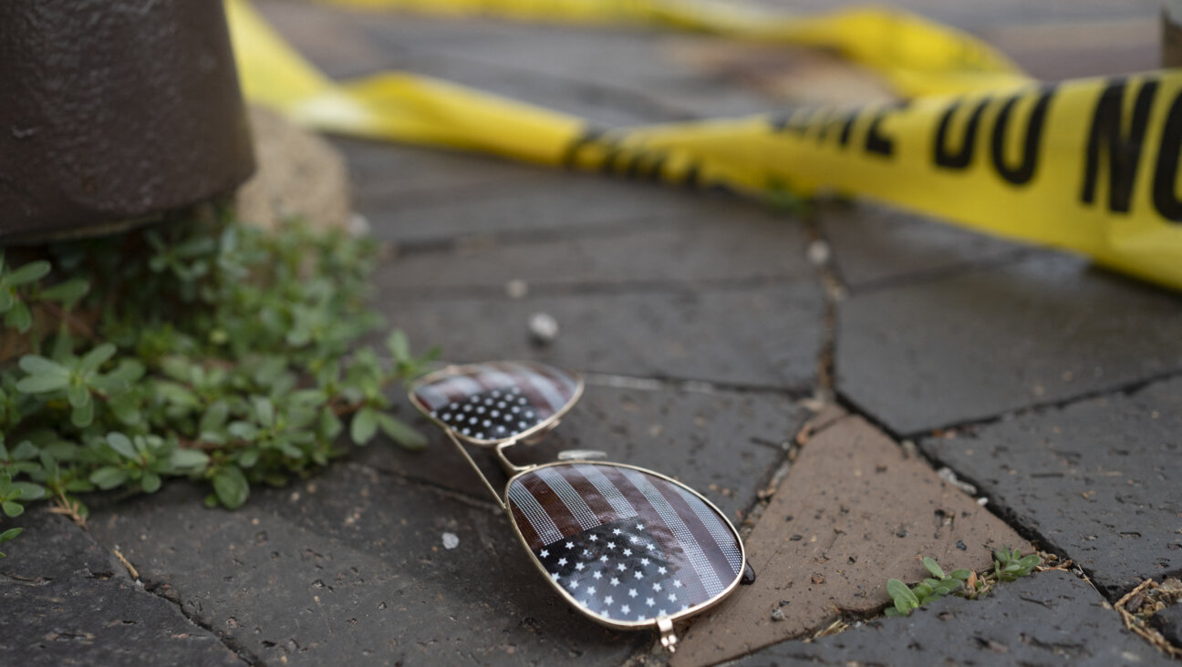 Police crime tape at the scene of the Fourth of July parade shooting in Highland Park, Illinois on July 4, 2022