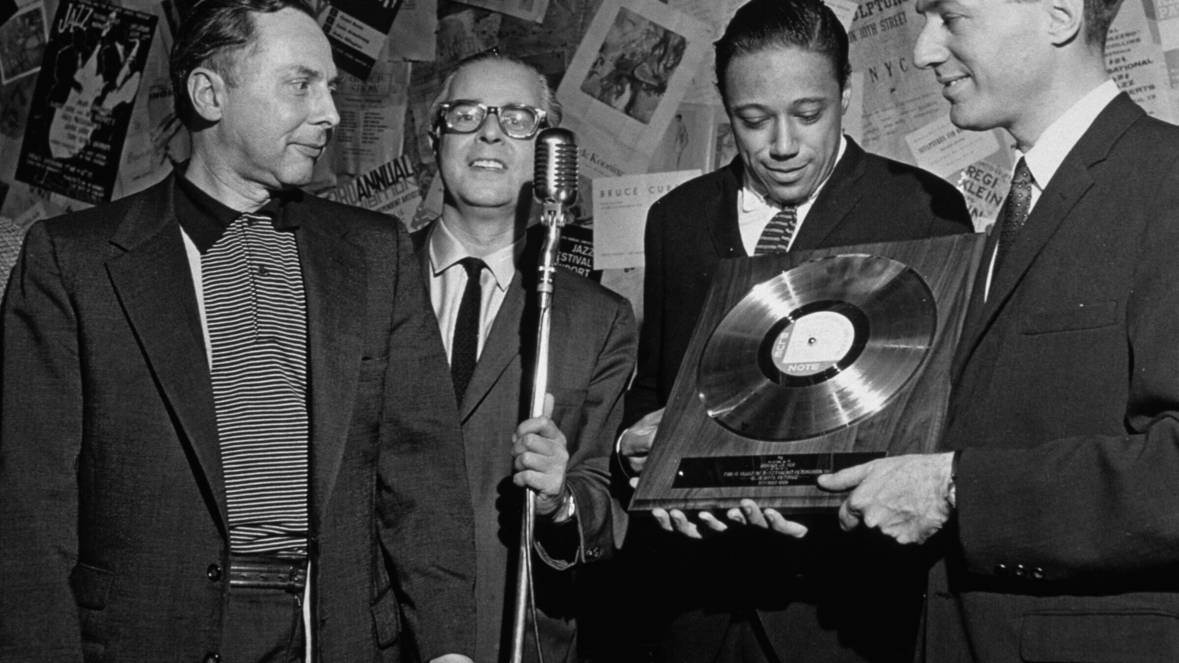 Jazz pianist Horace Silver, second from right, receives an award from Blue Note records in 1959. Blue Note co-founder Alfred Lion, is second from left.
