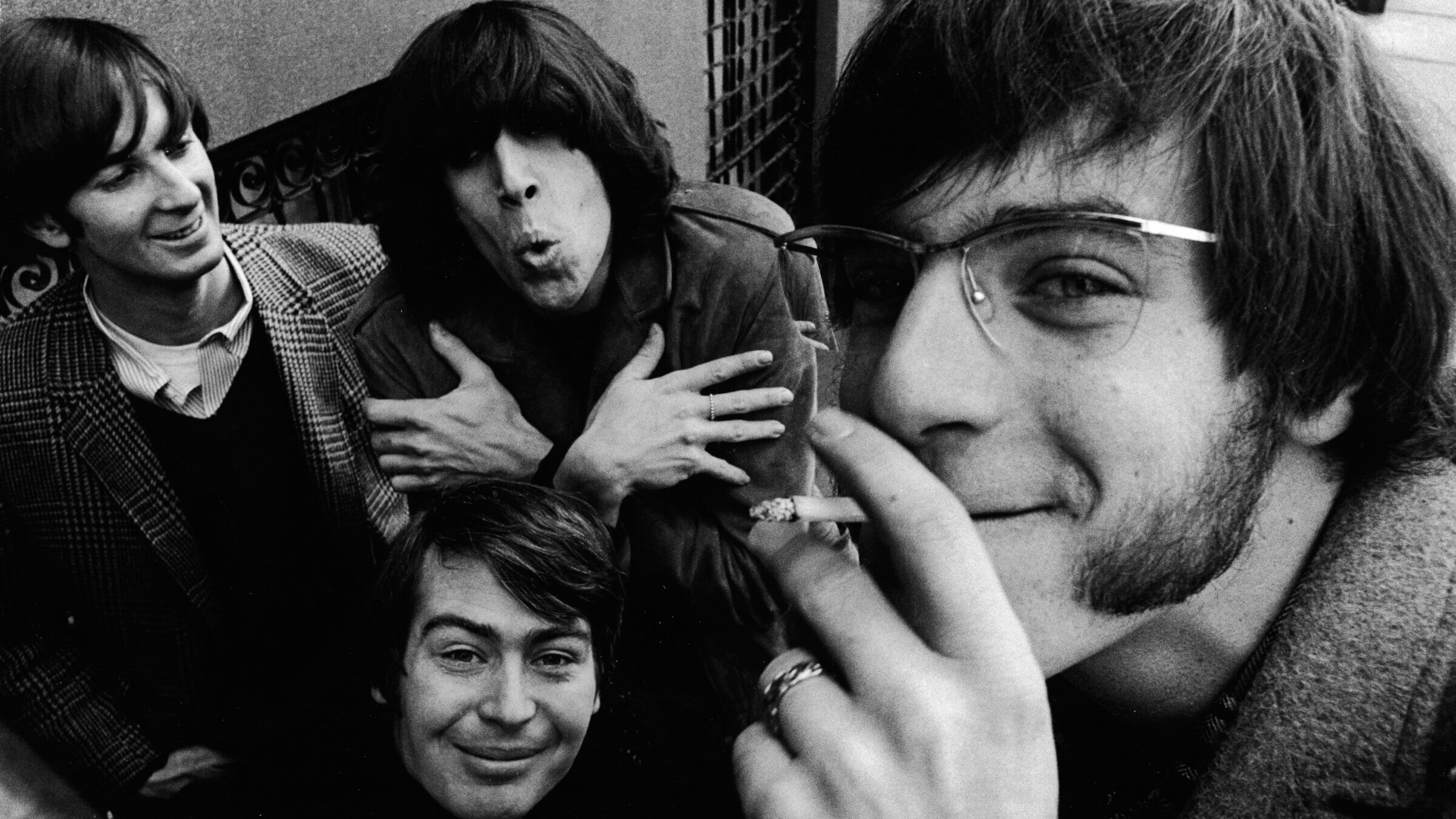  The Lovin' Spoonful pose on a street in the 1960s. Clockwise from bottom: drummer Joe Butler, bassist Steve Boone, co-founder and lead guitarist Zal Yanovsky and co-founder and singer John Sebastian. 