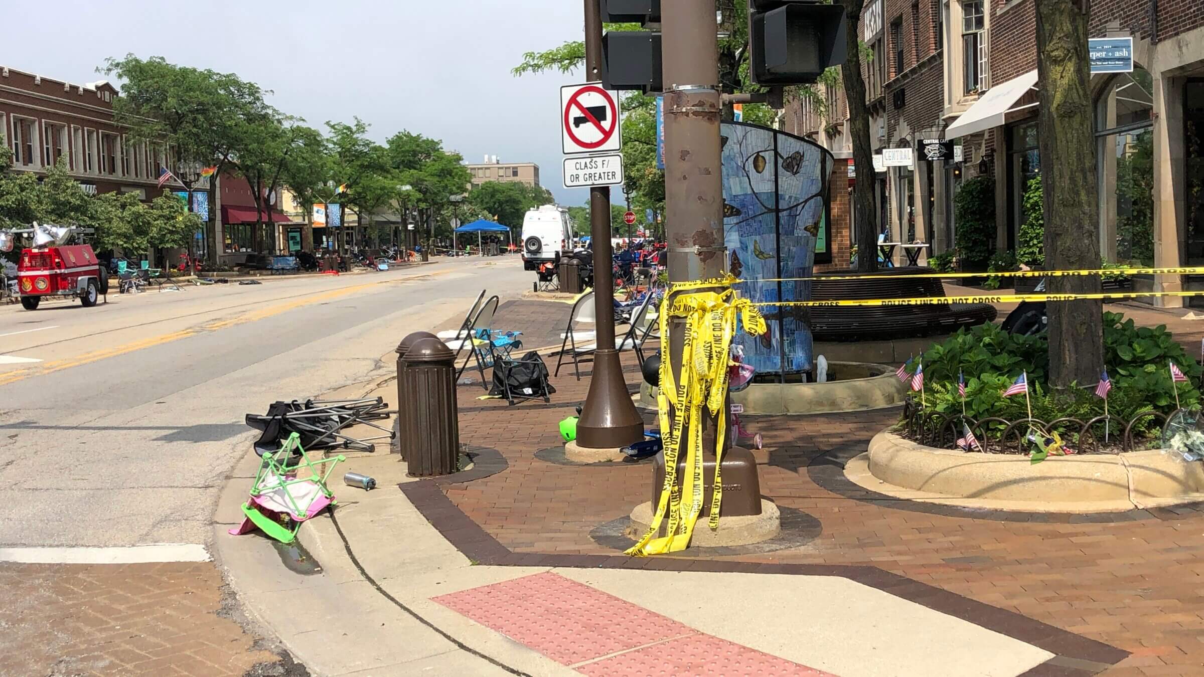 A section of Highland Park's Central Avenue remains cordoned off with lawn chairs left by parade attendees days after the deadly shooting there on July 4.