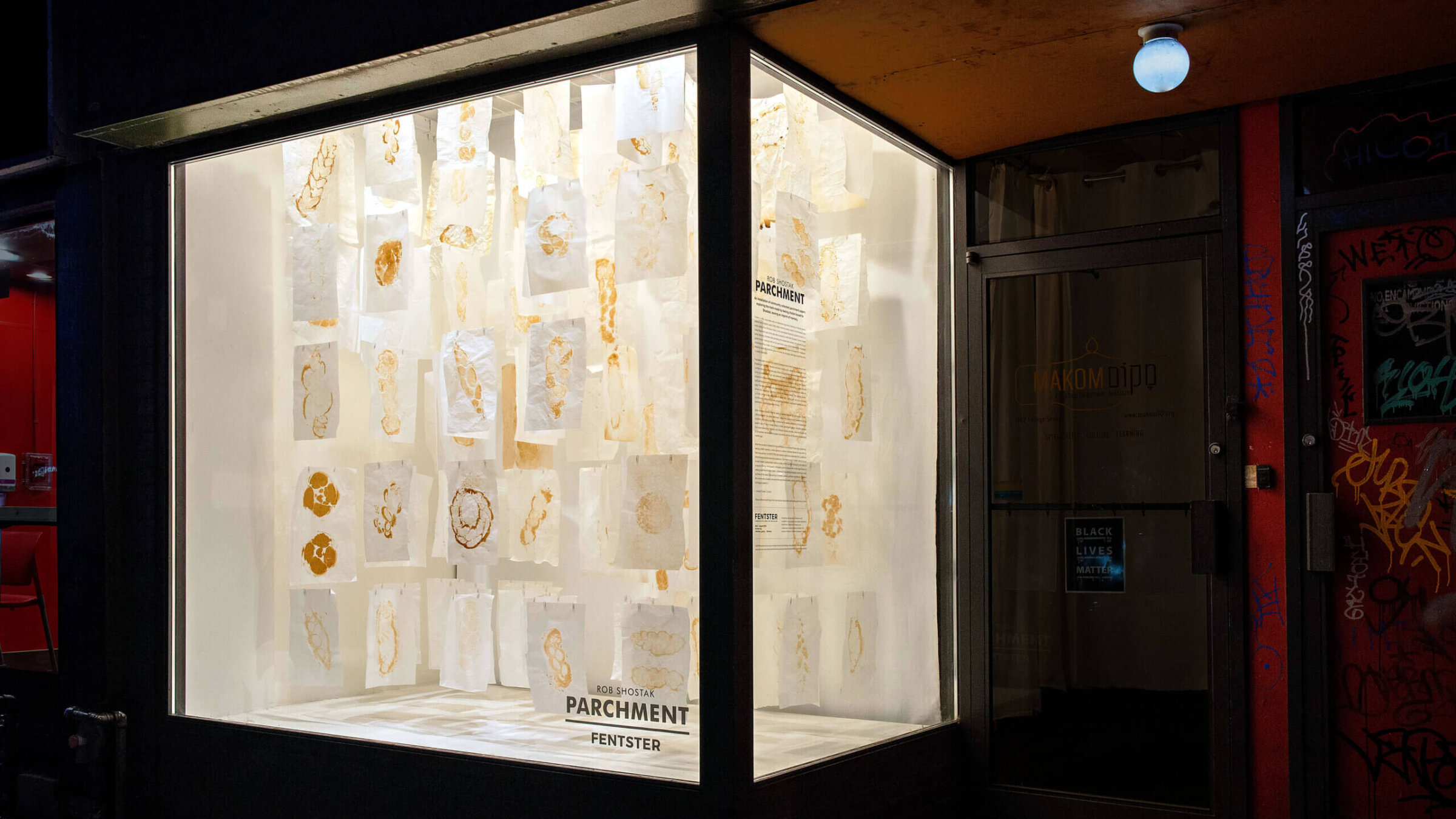 “Parchment” installed at Fentster, viewable by passers-by. Tauben said the exhibit causes a lot of double-takes.