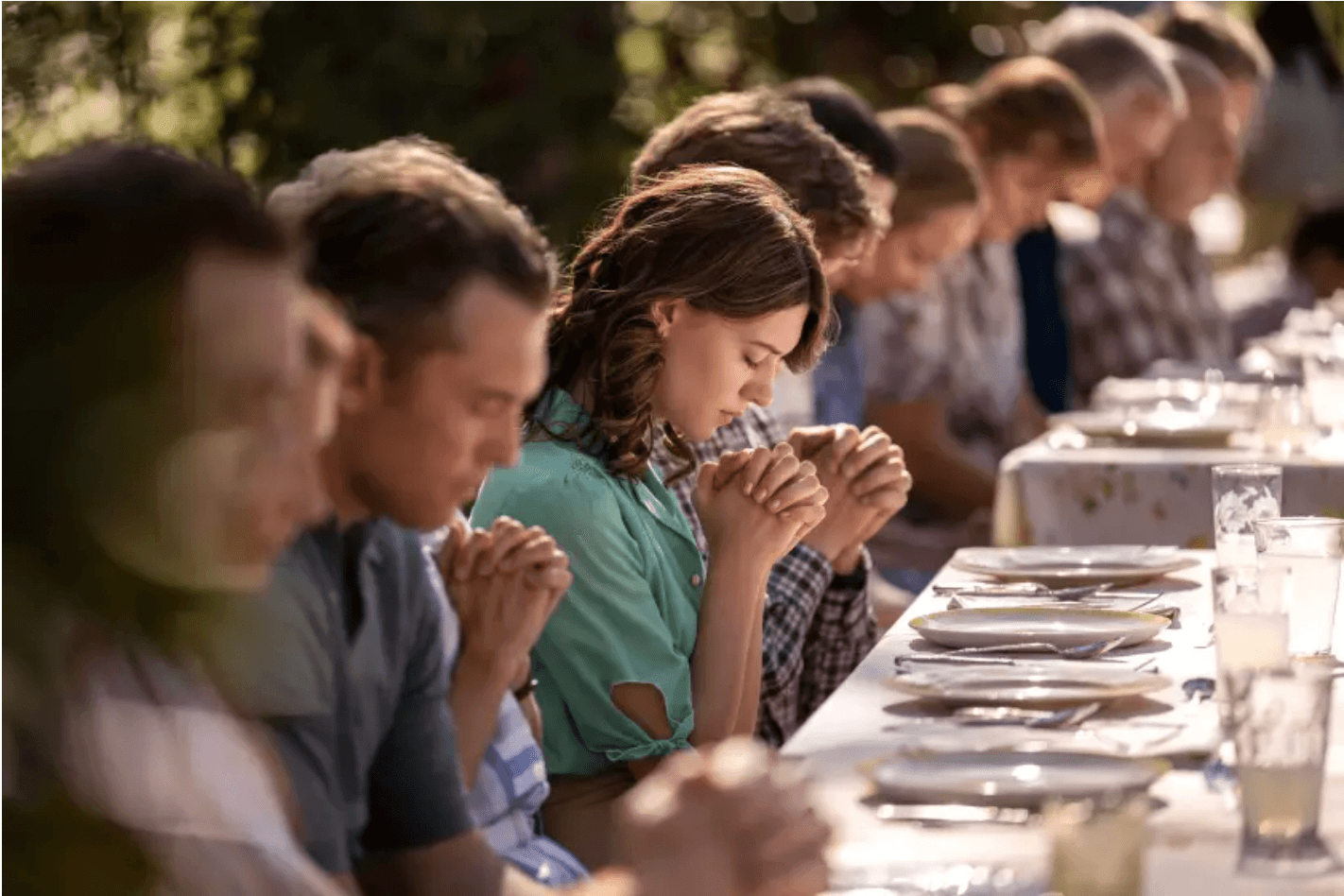 Praying before a meal in “Under the Banner of Heaven.”