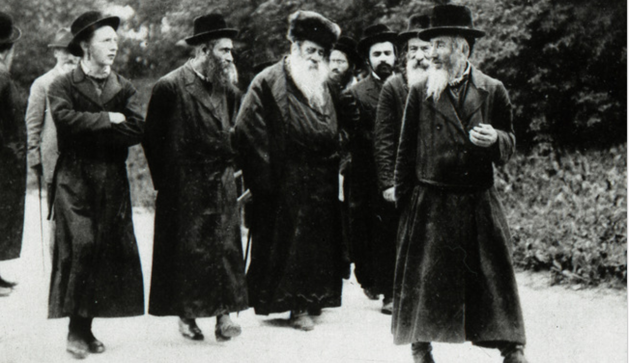 The Belzer Rebbe, out for a walk with his Hasidim, at Marienbad, where he had come for a cure, March 2, 1924.

