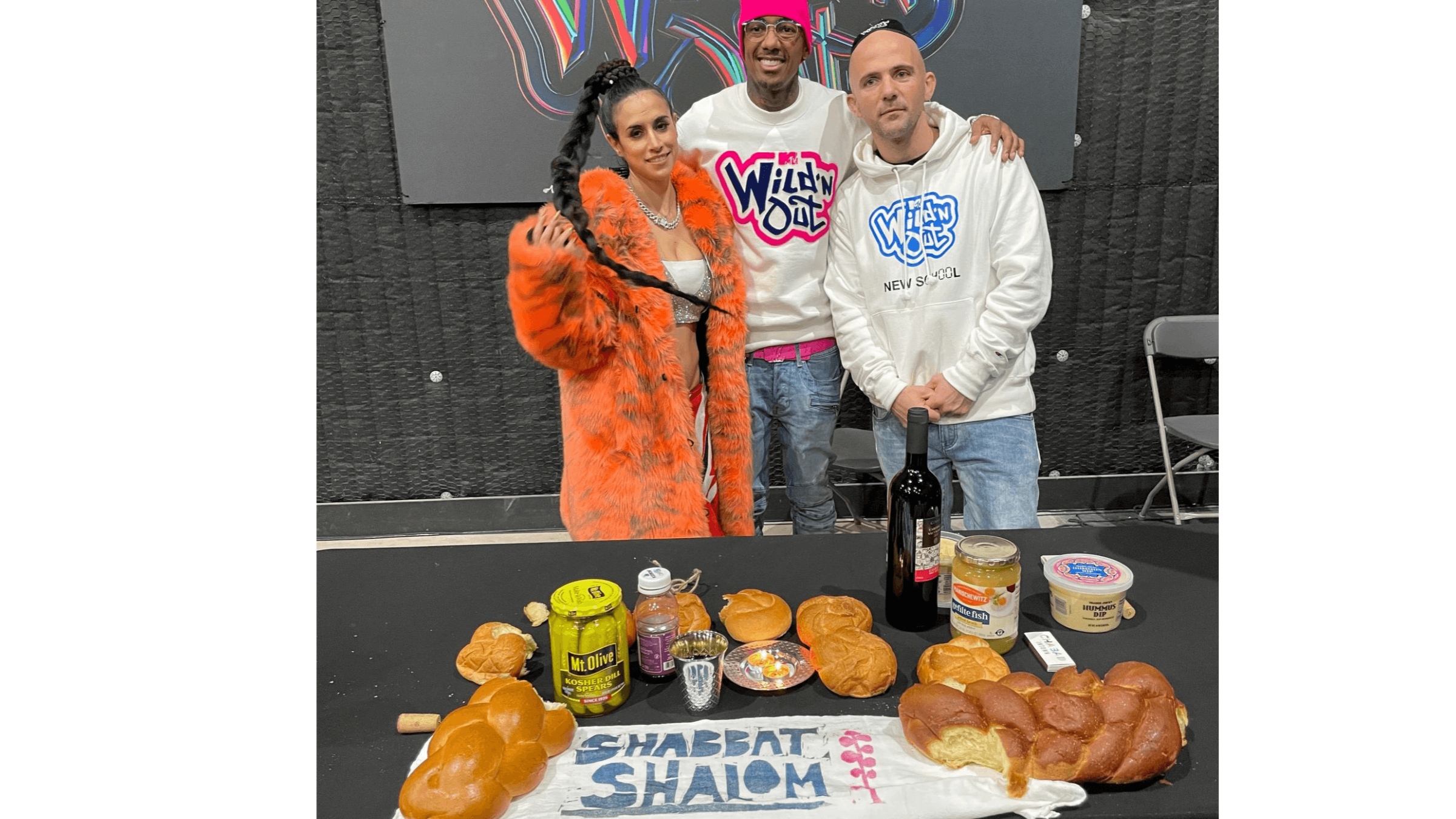 Israeli comedian Or Mash, left, stands with Nick Cannon, center, and rapper Kosha Dillz, right. Mash and Dillz were chosen to appear on Cannon’s “Wild ’N Out” show. 